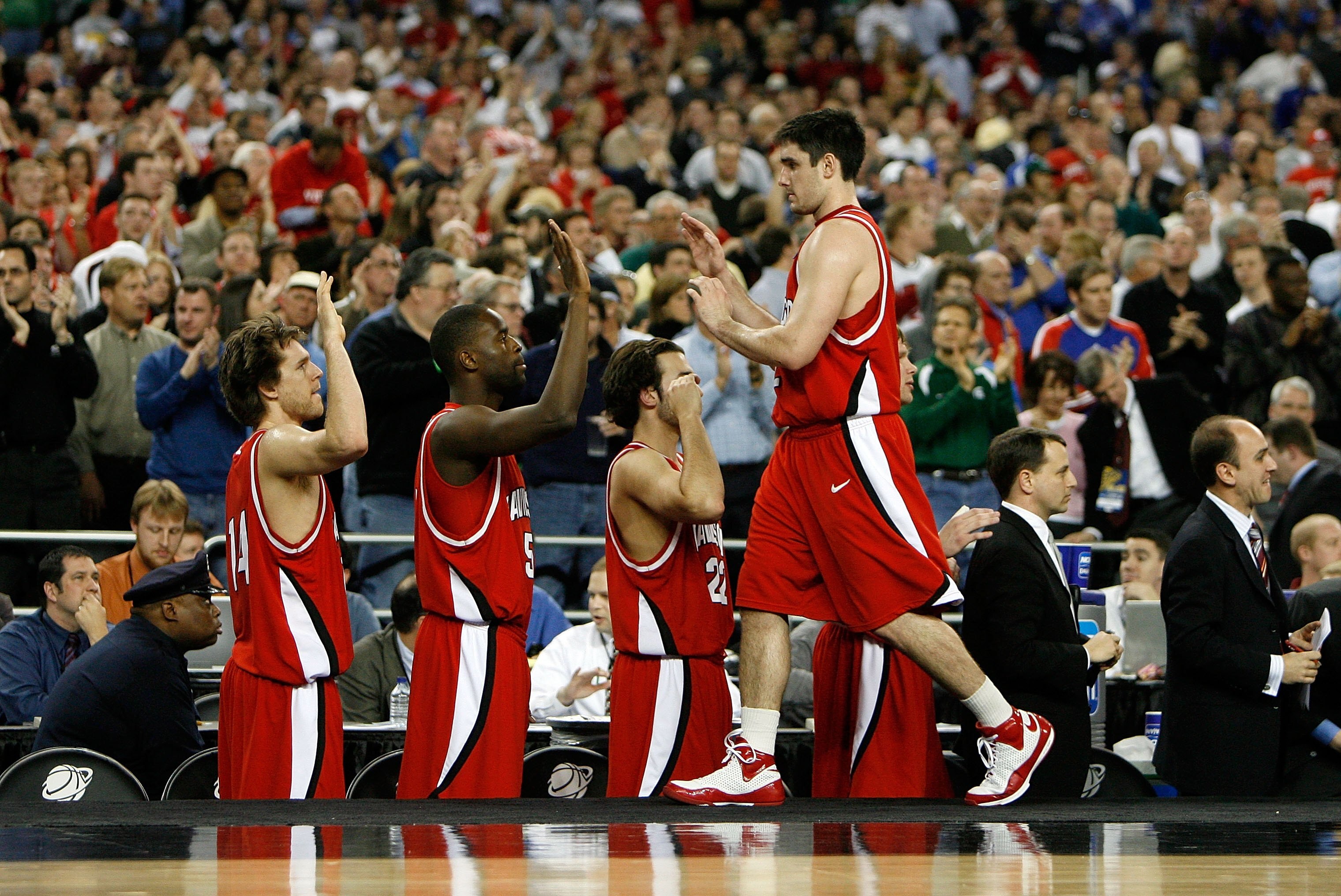 DETROIT - MARCH 28:  Jason Richards #2 of the Davidson Wildcats greets his teammates as he checks out of the game late in the second half against the Wisconsin Badgers during the Midwest Regional Semifinal of the 2008 NCAA Division I Men's Basketball Tour