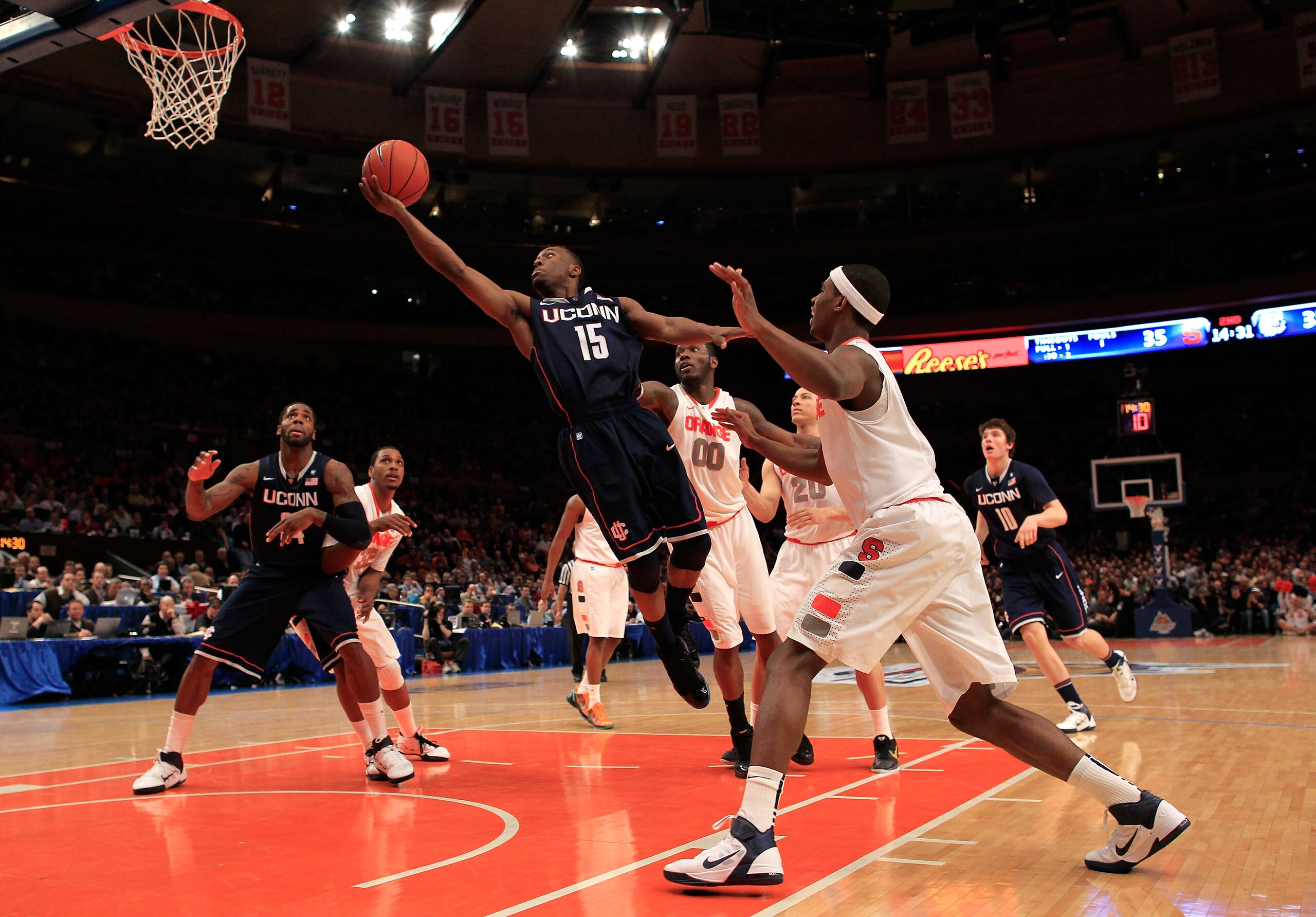 NEW YORK, NY - MARCH 11:  Kemba Walker #15 of the Connecticut Huskies drives to the basket against Syracuse Orange during the semifinals of the 2011 Big East Men's Basketball Tournament presented by American Eagle Outfitters at Madison Square Garden on Ma
