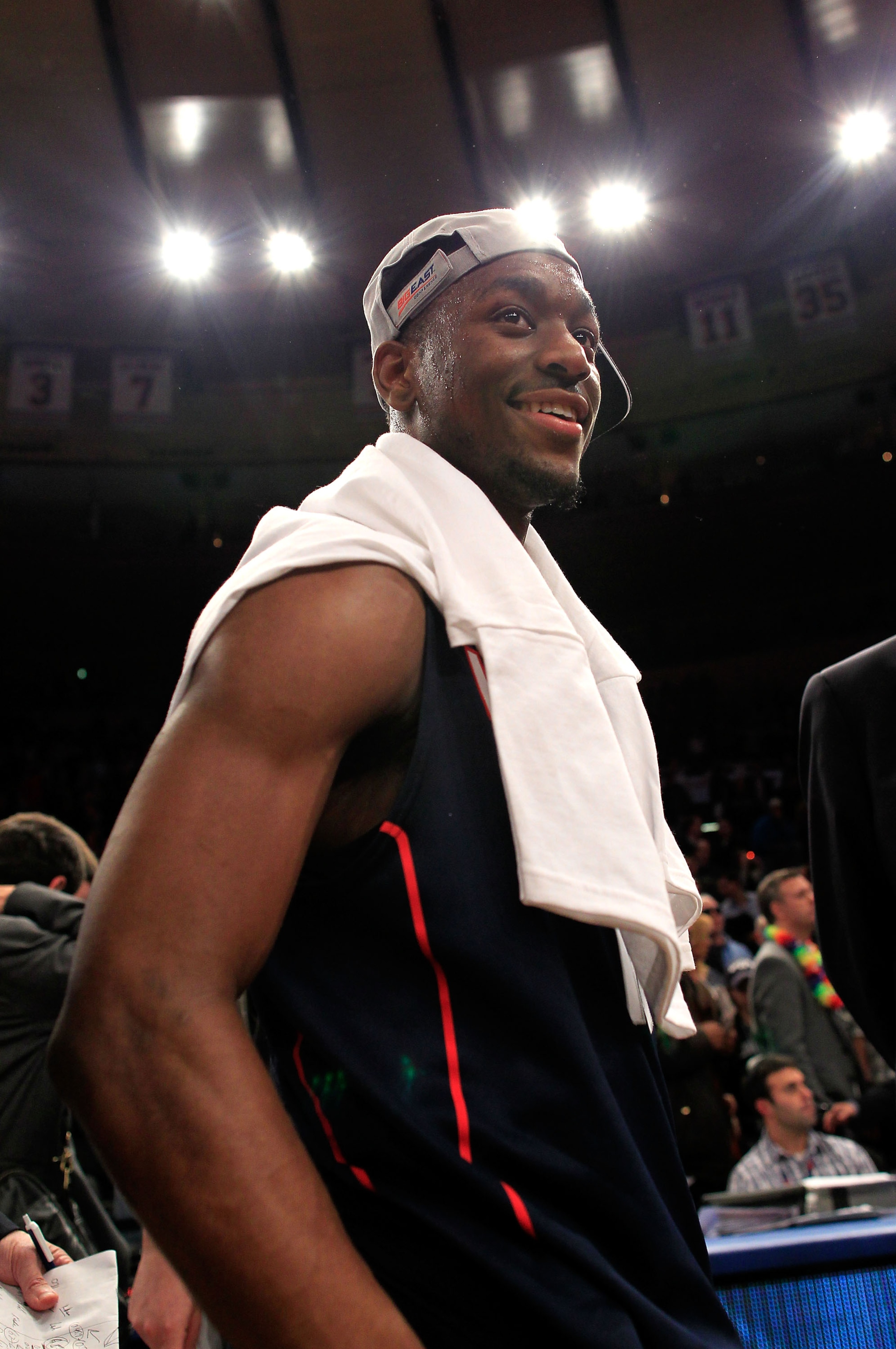 NEW YORK, NY - MARCH 12: Kemba Walker #15 of the Connecticut Huskies smiles after defeating the Louisville Cardinals during the championship of the 2011 Big East Men's Basketball Tournament presented by American Eagle Outfitters at Madison Square Garden o