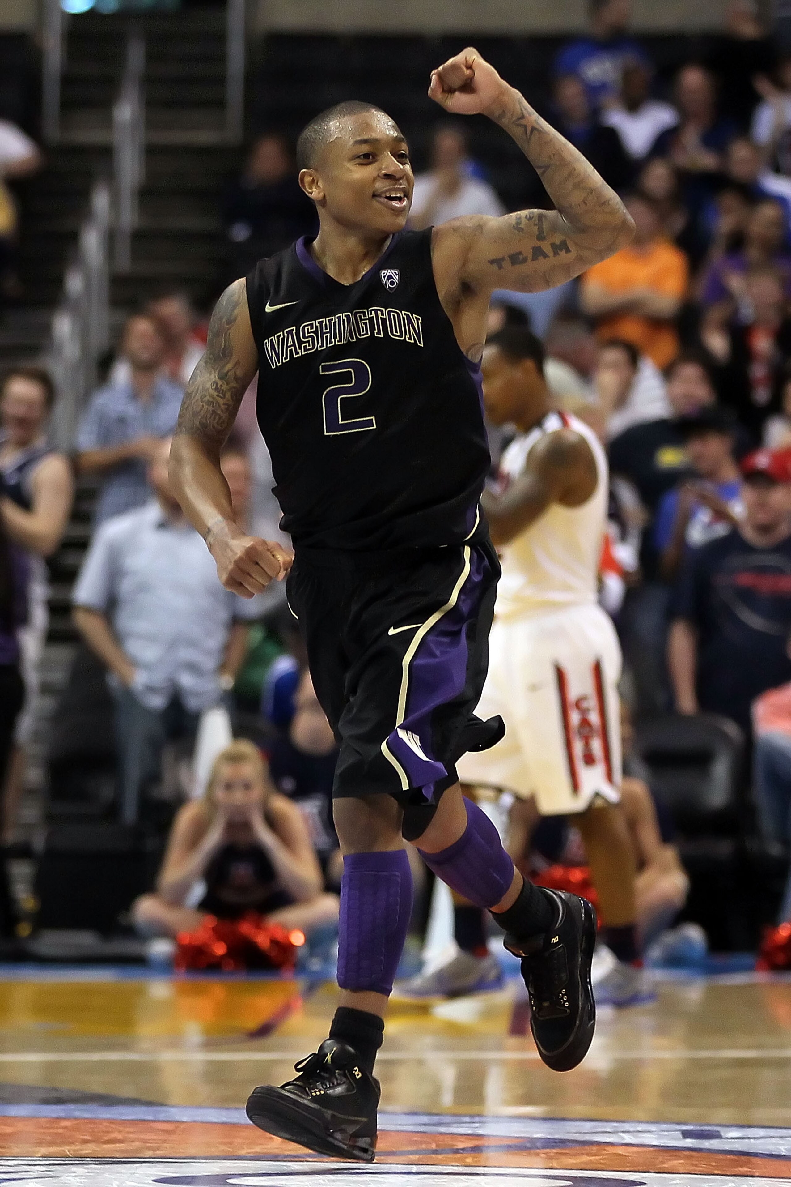 LOS ANGELES, CA - MARCH 12:  Isaiah Thomas #2 of the Washington Huskies reacts as the Arizona Wildcats miss a buzzer shot and the game goes into overtime in the championship game of the 2011 Pacific Life Pac-10 Men's Basketball Tournament at Staples Cente