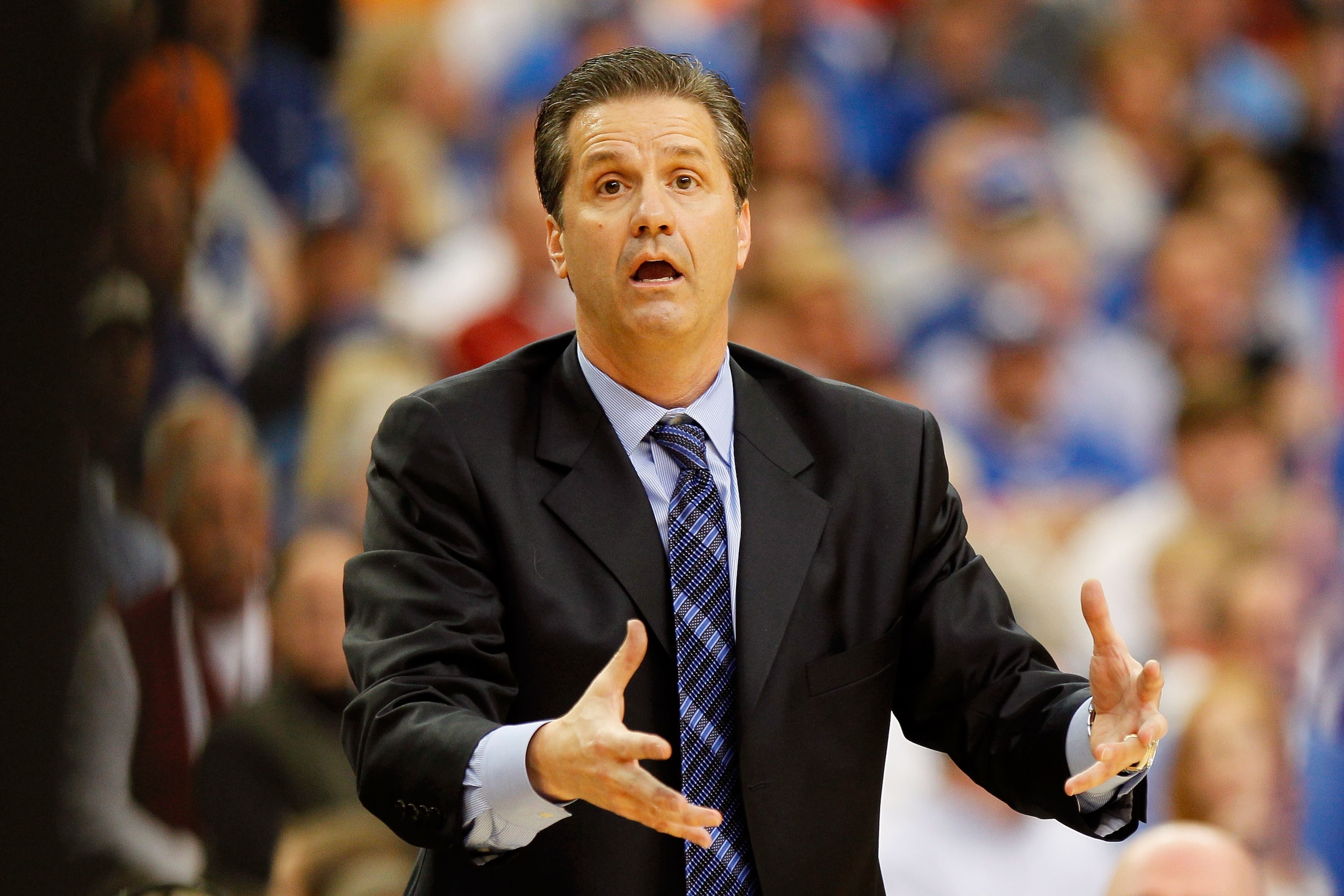 ATLANTA, GA - MARCH 12:  Head coach John Calipari of the Kentucky Wildcats coaches against the Alabama Crimson Tide during the semifinals of the SEC Men's Basketball Tournament at Georgia Dome on March 12, 2011 in Atlanta, Georgia.  (Photo by Kevin C. Cox