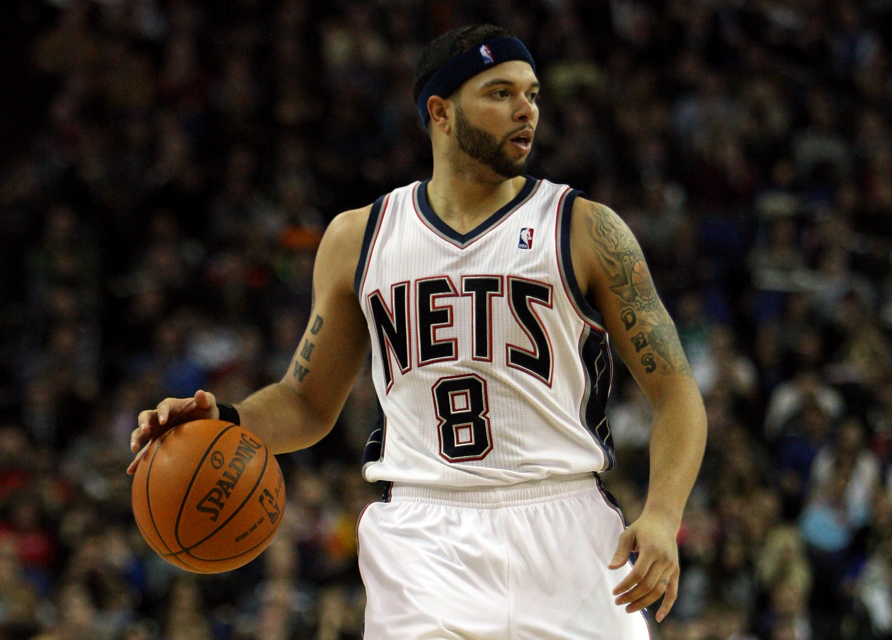 LONDON, ENGLAND - MARCH 04:  #8 Deron Williams of the Nets in action during the NBA match between New Jersey Nets and the Toronto Raptors at the O2 Arena on March 4, 2011 in London, England. NOTE TO USER: User expressly acknowledges and agrees that, by do