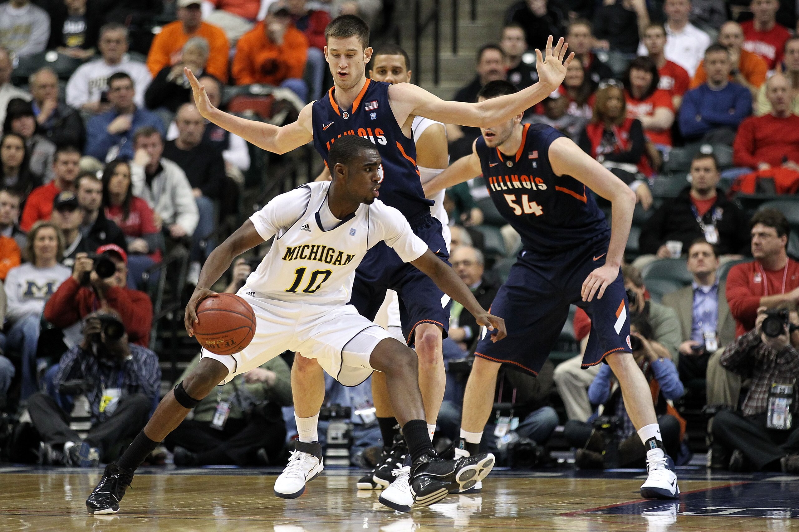 INDIANAPOLIS, IN - MARCH 11:  Tim Hardaway Jr. #10 of the Michigan Wolverines drives against the Illinois Fighting Illini during the quarterfinals of the 2011 Big Ten Men's Basketball Tournament at Conseco Fieldhouse on March 11, 2011 in Indianapolis, Ind