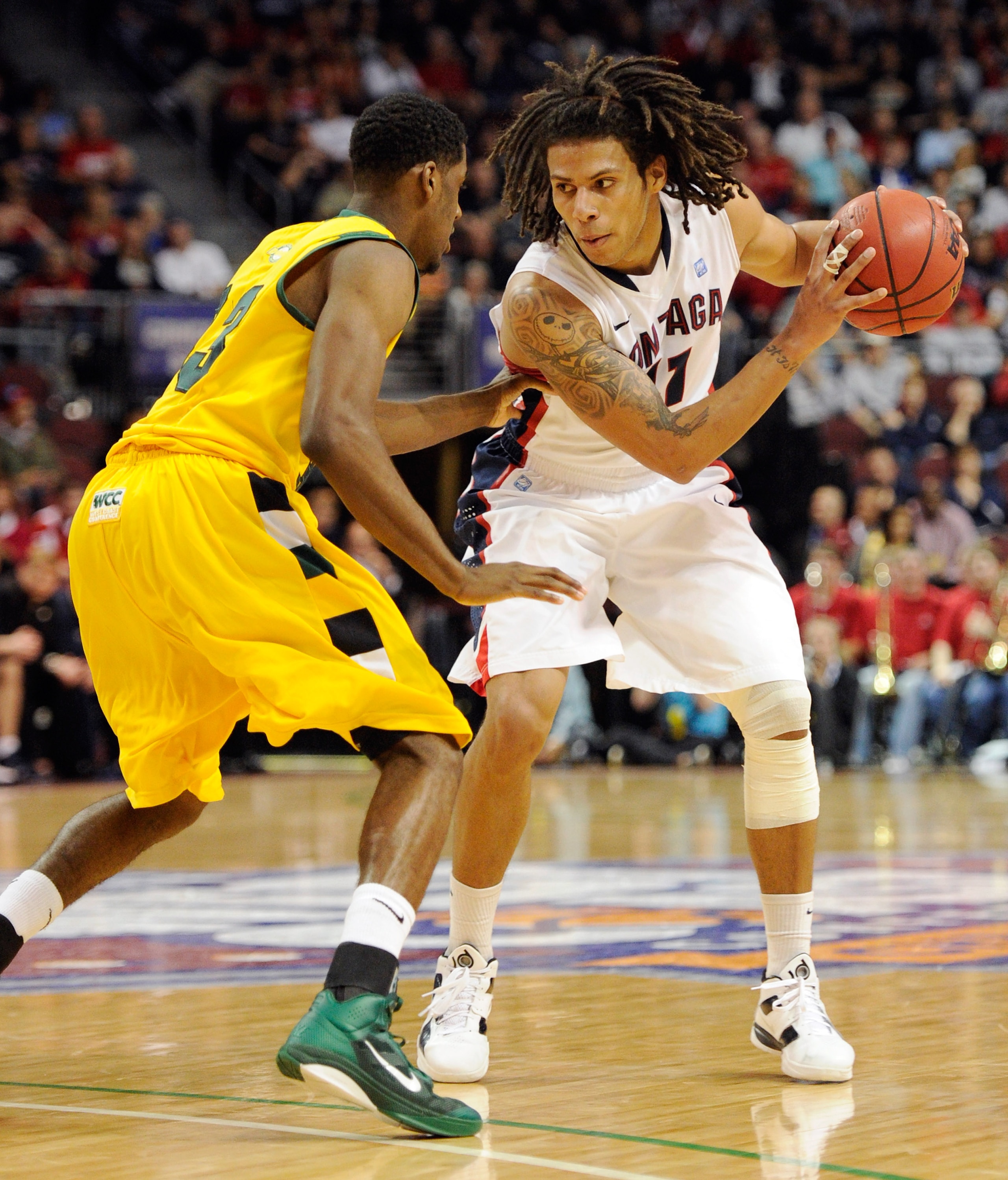 LAS VEGAS, NV - MARCH 06:  Steven Gray #41 of the Gonzaga Bulldogs looks to get around Avery Johnson #33 of the San Francisco Dons during a semifinal game of the Zappos.com West Coast Conference Basketball tournament at the Orleans Arena March 6, 2011 in