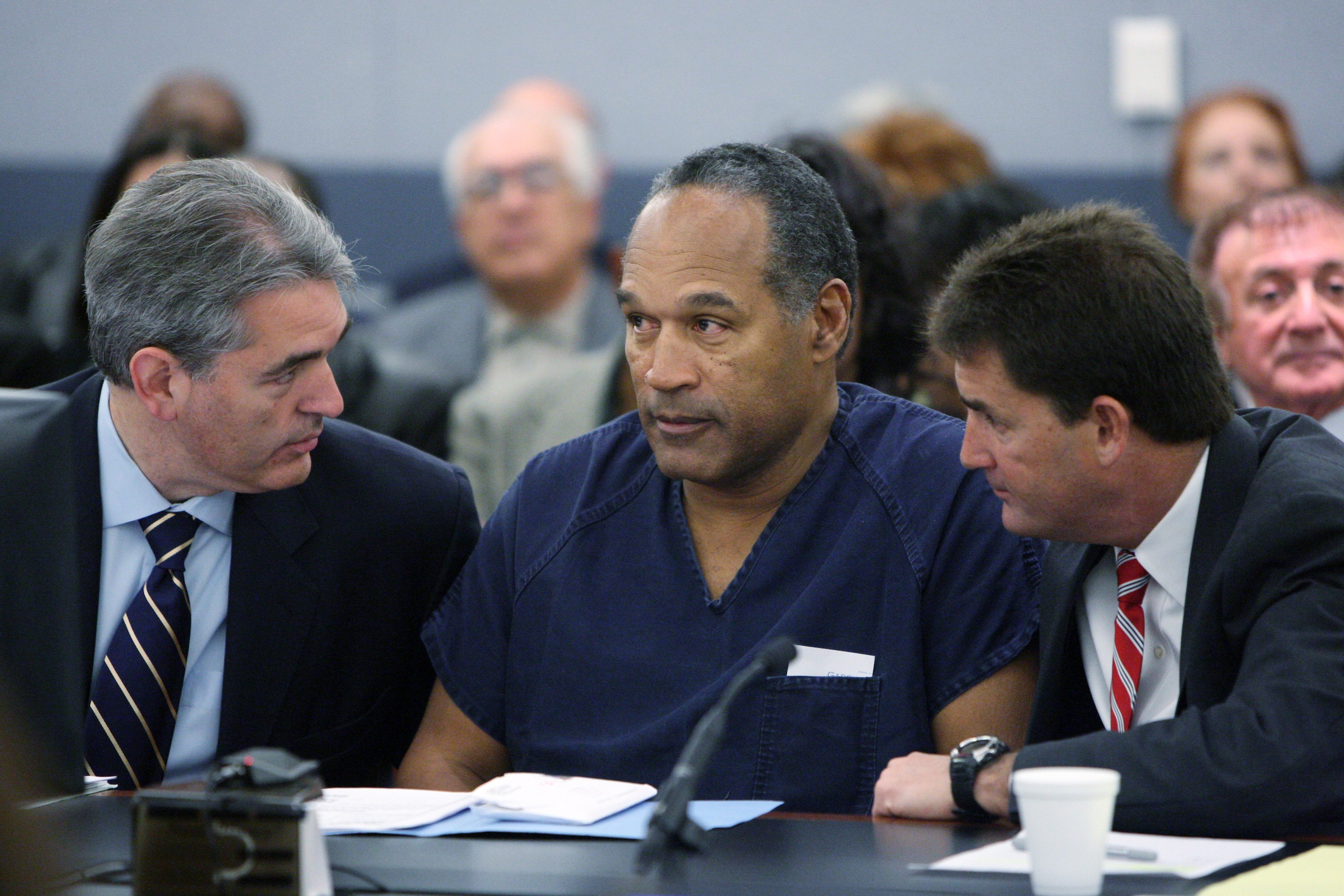 LAS VEGAS - DECEMBER 5:  O.J. Simpson (C) appears in court with attorneys Gabriel Grasso (L) and Yale Galanter prior to sentencing at the Clark County Regional Justice Center December 5, 2008 in Las Vegas, Nevada.  Simpson and co-defendant Clarence 'C.J.'