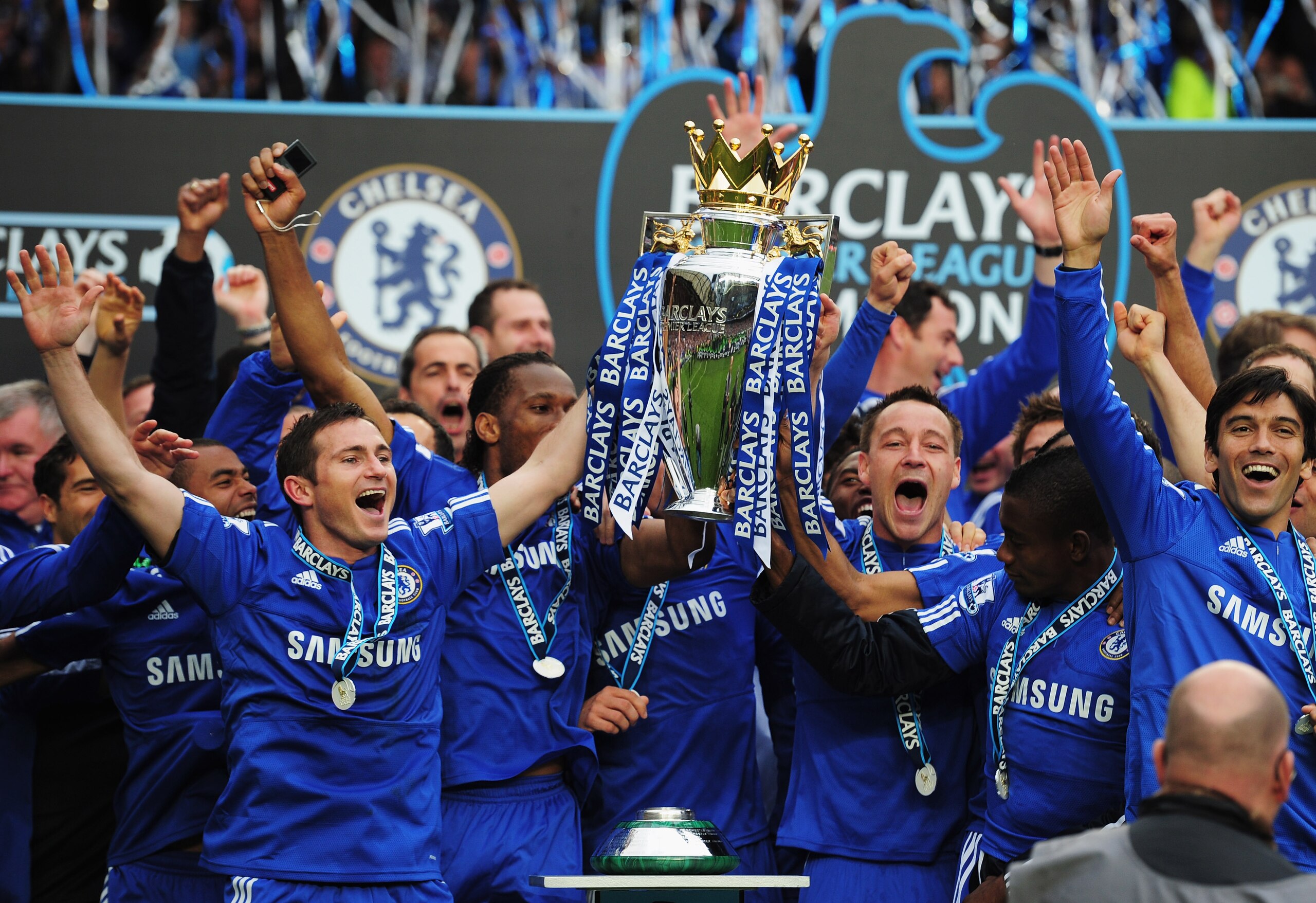 LONDON, ENGLAND - MAY 09:  John Terry and Frank Lamaprd of Chelse lift the trophy after the Barclays Premier League match between Chelsea and Wigan Athletic at Stamford Bridge on May 9, 2010 in London, England. Chelsea won 8-0 to win the title.  (Photo by