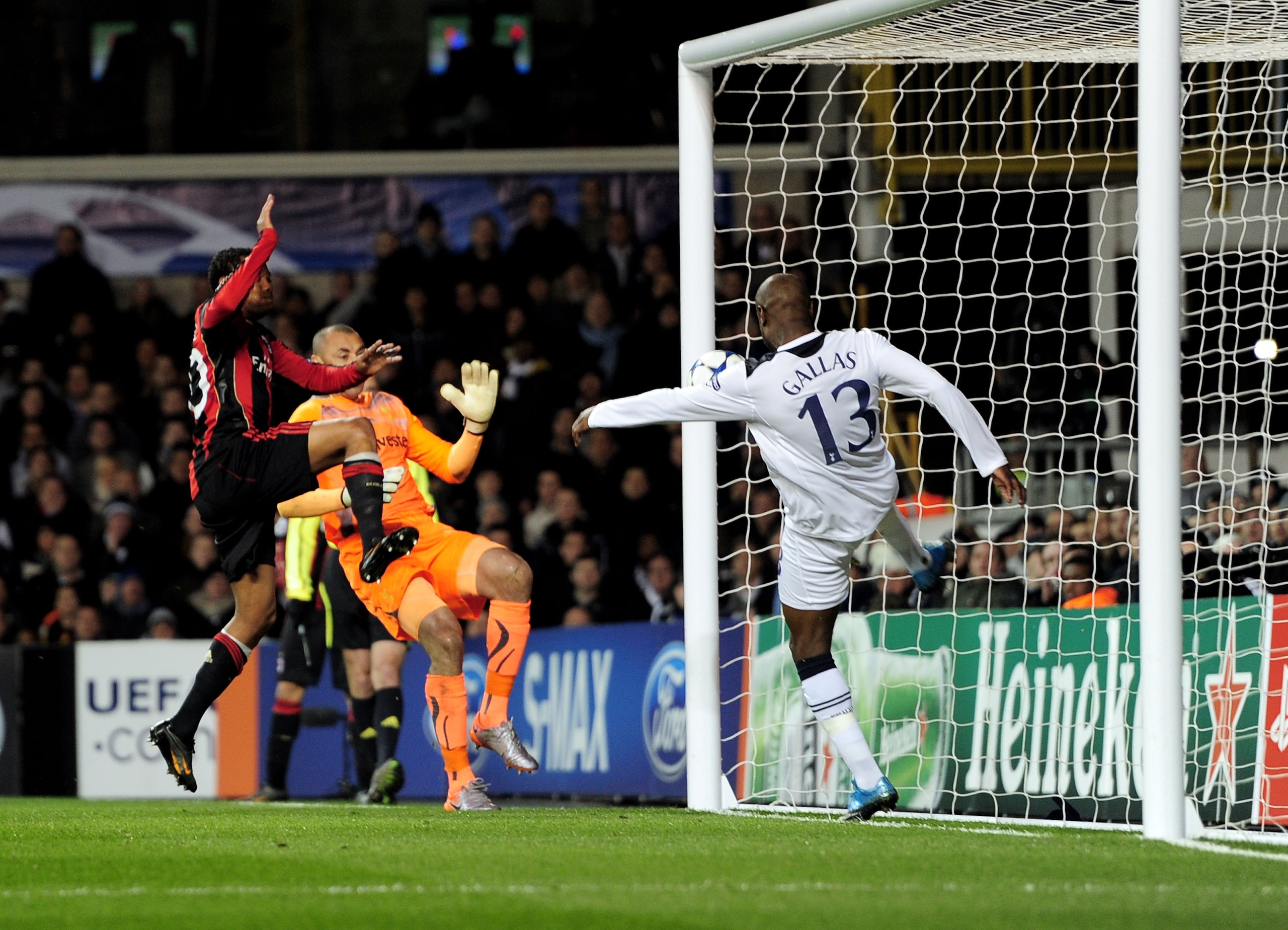 LONDON, ENGLAND - MARCH 09:  William Gallas (R) of Tottenham clears the effort of Robinho (L) of Milan off the line during the UEFA Champions League round of 16 second leg match between Tottenham Hotspur and AC Milan at White Hart Lane on March 9, 2011 in