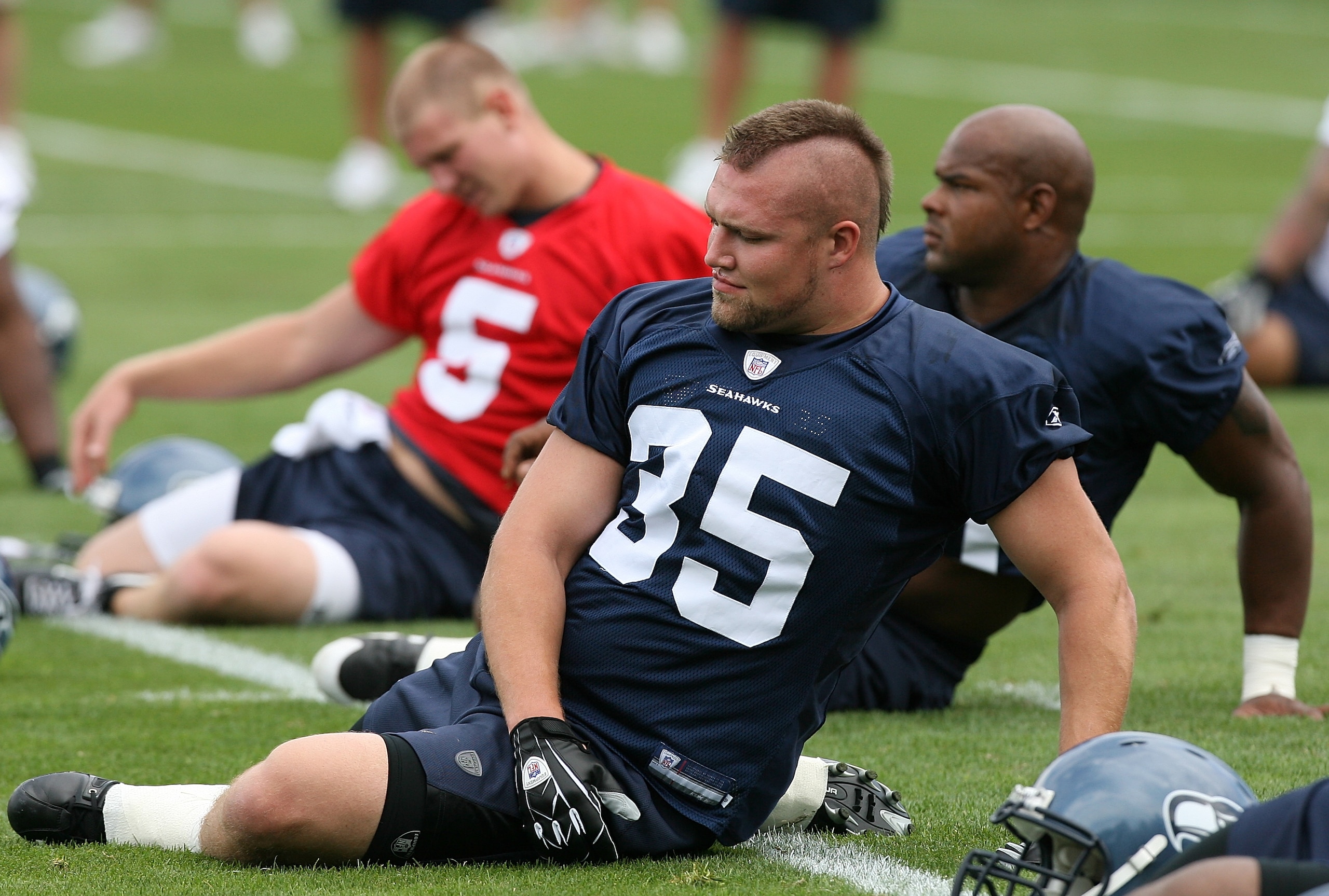 KIRKLAND, WA - JULY 25: Fullback Owen Schmitt #35 of the Seattle Seahawks stretches during training camp at the team's training facility on July 25, 2008 in Kirkland, Washington. (Photo by Otto Greule Jr/Getty Images)