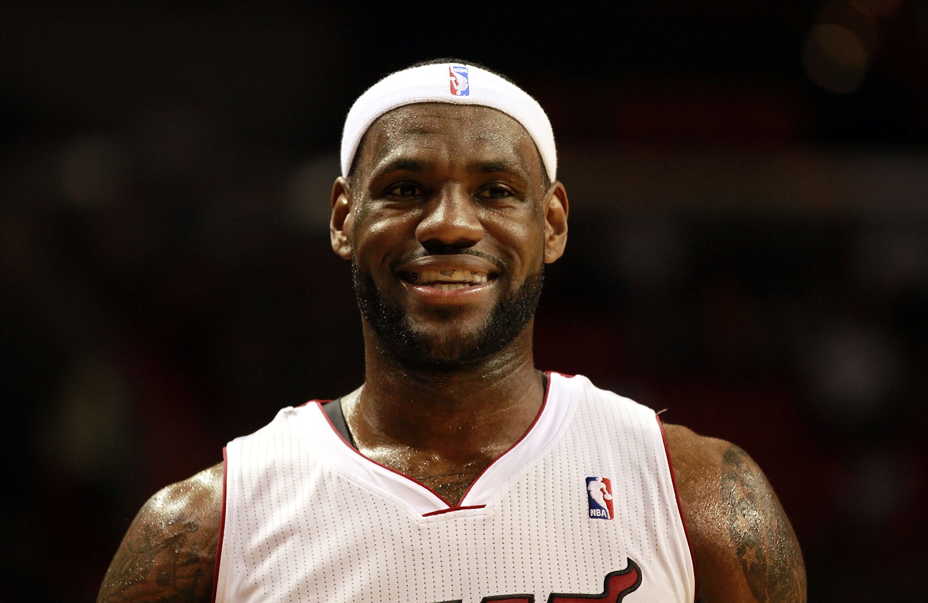 MIAMI - MARCH 12:  Forward LeBron James #6 of the Miami Heat is introduced against the Memphis Grizzlies at American Airlines Arena on March 12, 2011 in Miami, Florida. NOTE TO USER: User expressly acknowledges and agrees that, by downloading and/or using