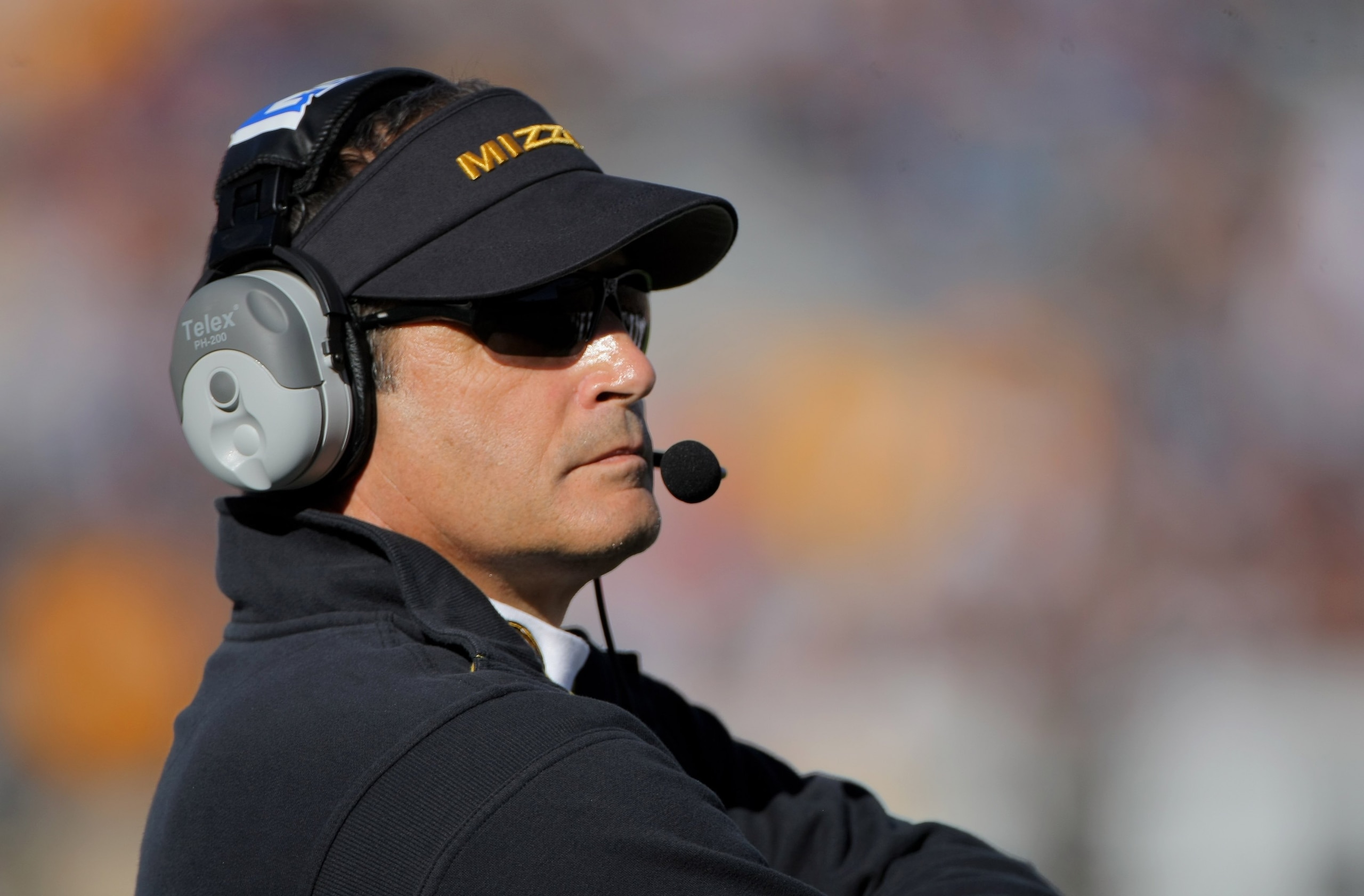 BOULDER, CO - OCTOBER 31:  Head coach Gary Pinkel of the Missouri Tigers leads his team against the Colorado Buffaloes at Folsom Field on October 31, 2009 in Boulder, Colorado. Missouri defeated Colorado 36-17.  (Photo by Doug Pensinger/Getty Images)