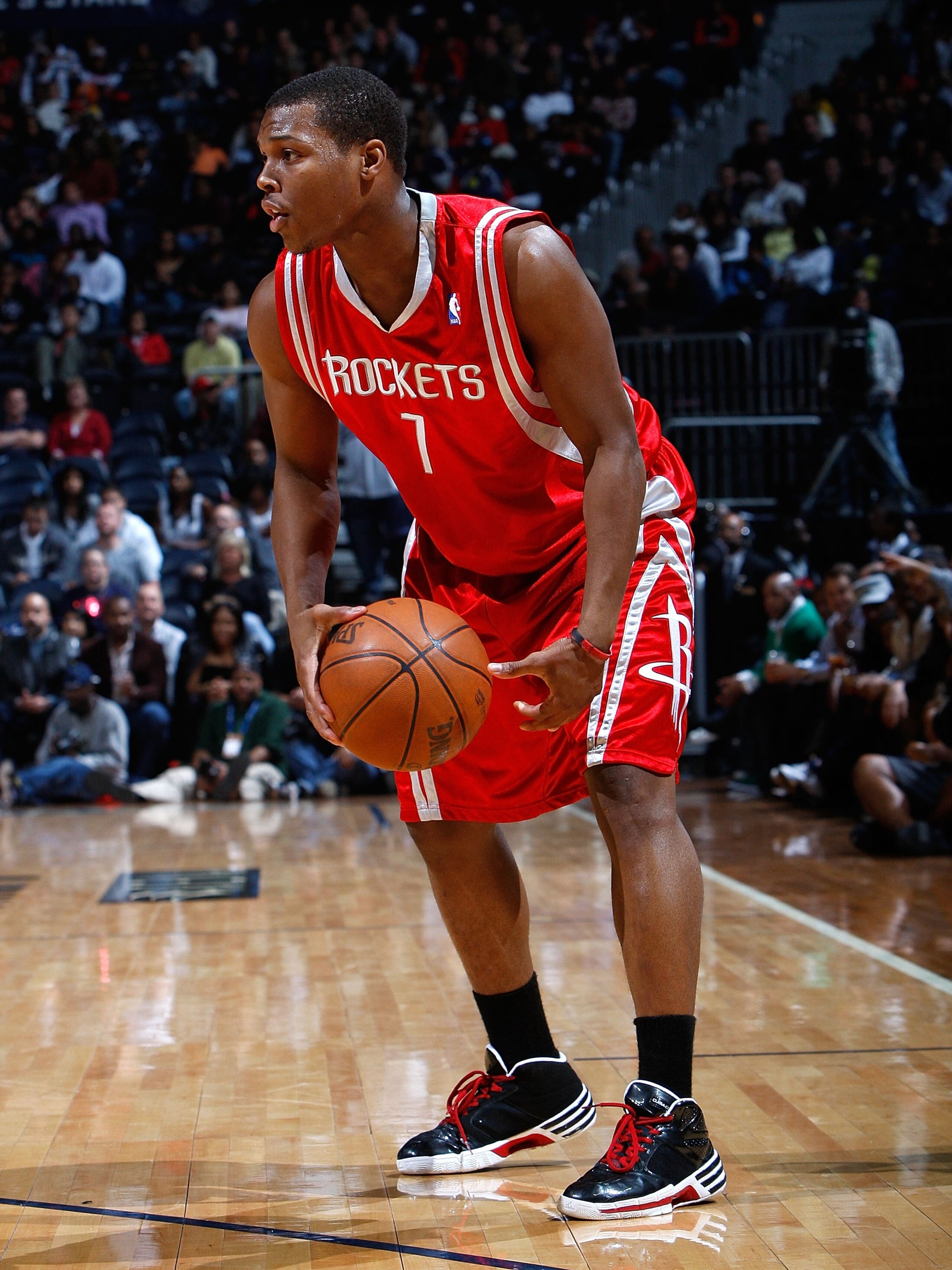 ATLANTA - NOVEMBER 20: Kyle Lowry #7 of the Houston Rockets against the Atlanta Hawks at Philips Arena on November 20, 2009 in Atlanta, Georgia. NOTE TO USER: User expressly acknowledges and agrees that, by downloading and/or using this Photograph, User ATLANTA - NOVEMBER 20: Kyle Lowry #7 of the Houston Rockets against the Atlanta Hawks at Philips Arena on November 20, 2009 in Atlanta, Georgia. NOTE TO USER: User expressly acknowledges and agrees that, by downloading and/or using this Photograph, User