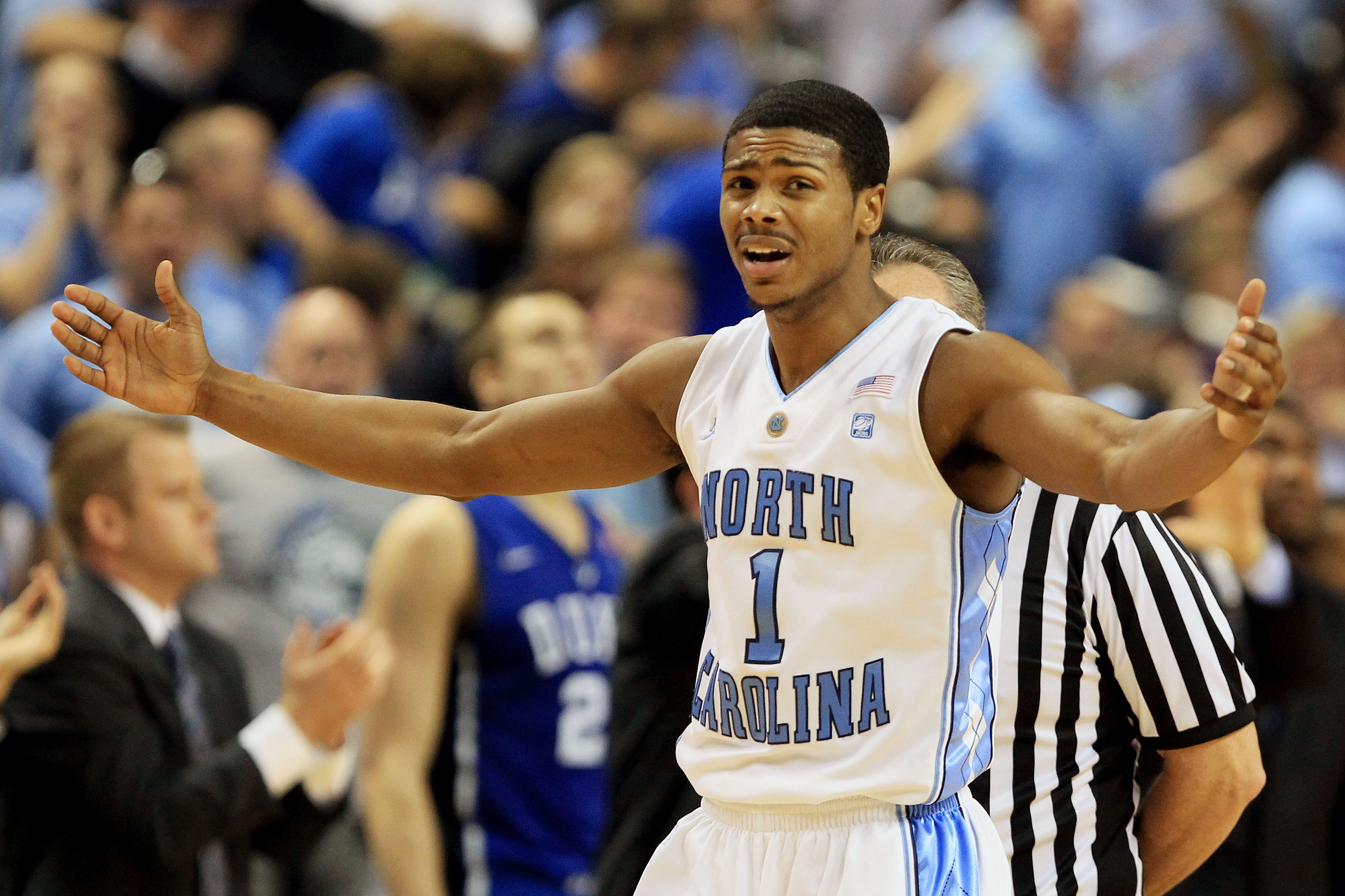 GREENSBORO, NC - MARCH 13:  Dexter Strickland #1 of the North Carolina Tar Heels reacts while playing against the Duke Blue Devils during the first half in the championship game of the 2011 ACC men's basketball tournament at the Greensboro Coliseum on Mar