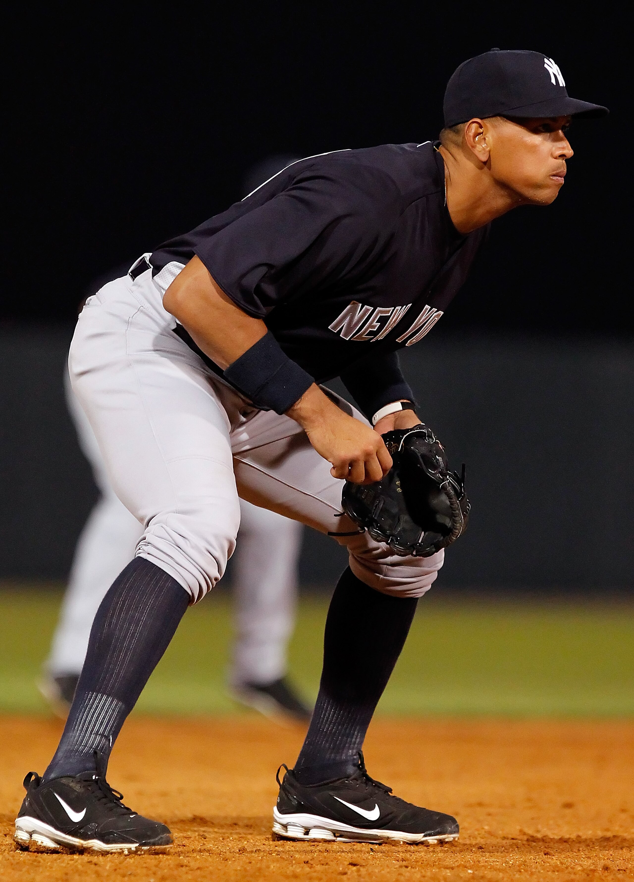 SARASOTA, FL - MARCH 07: Infielder Alex Rodriguez #13 of the New York Yankees gets into defensive position against the Baltimore Orioles during a Grapefruit League Spring Training Game at Ed Smith Stadium on March 7, 2011 in Sarasota, Florida. (Photo by SARASOTA, FL - MARCH 07: Infielder Alex Rodriguez #13 of the New York Yankees gets into defensive position against the Baltimore Orioles during a Grapefruit League Spring Training Game at Ed Smith Stadium on March 7, 2011 in Sarasota, Florida. (Photo by