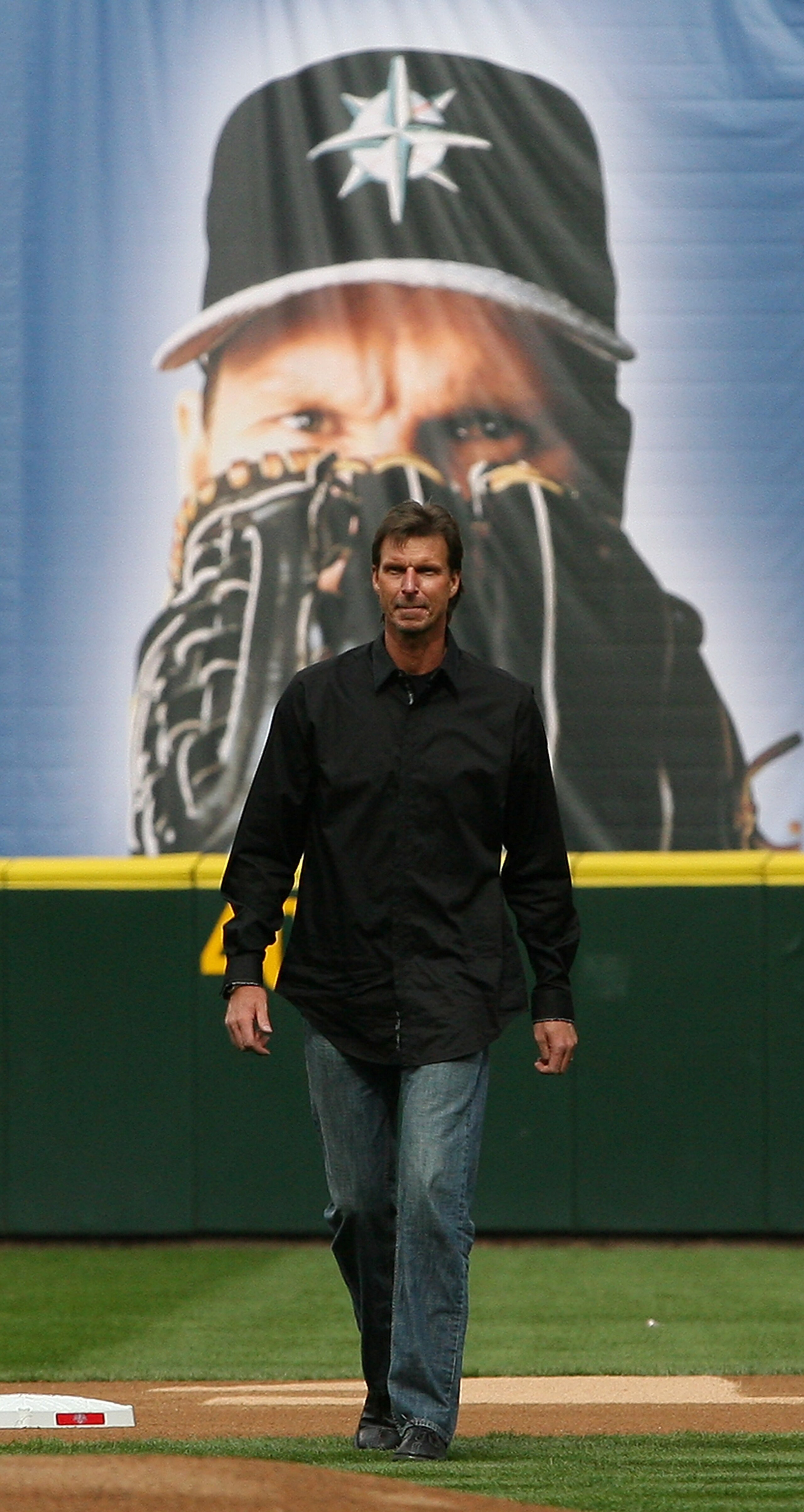 SEATTLE - APRIL 12: Former Mariners star Randy Johnson walks on to the field to throw out the ceremonial first pitch prior to the Mariners' home opener against the Oakland Athletics at Safeco Field on April 12, 2010 in Seattle, Washington. The Athletics SEATTLE - APRIL 12: Former Mariners star Randy Johnson walks on to the field to throw out the ceremonial first pitch prior to the Mariners' home opener against the Oakland Athletics at Safeco Field on April 12, 2010 in Seattle, Washington. The Athletics