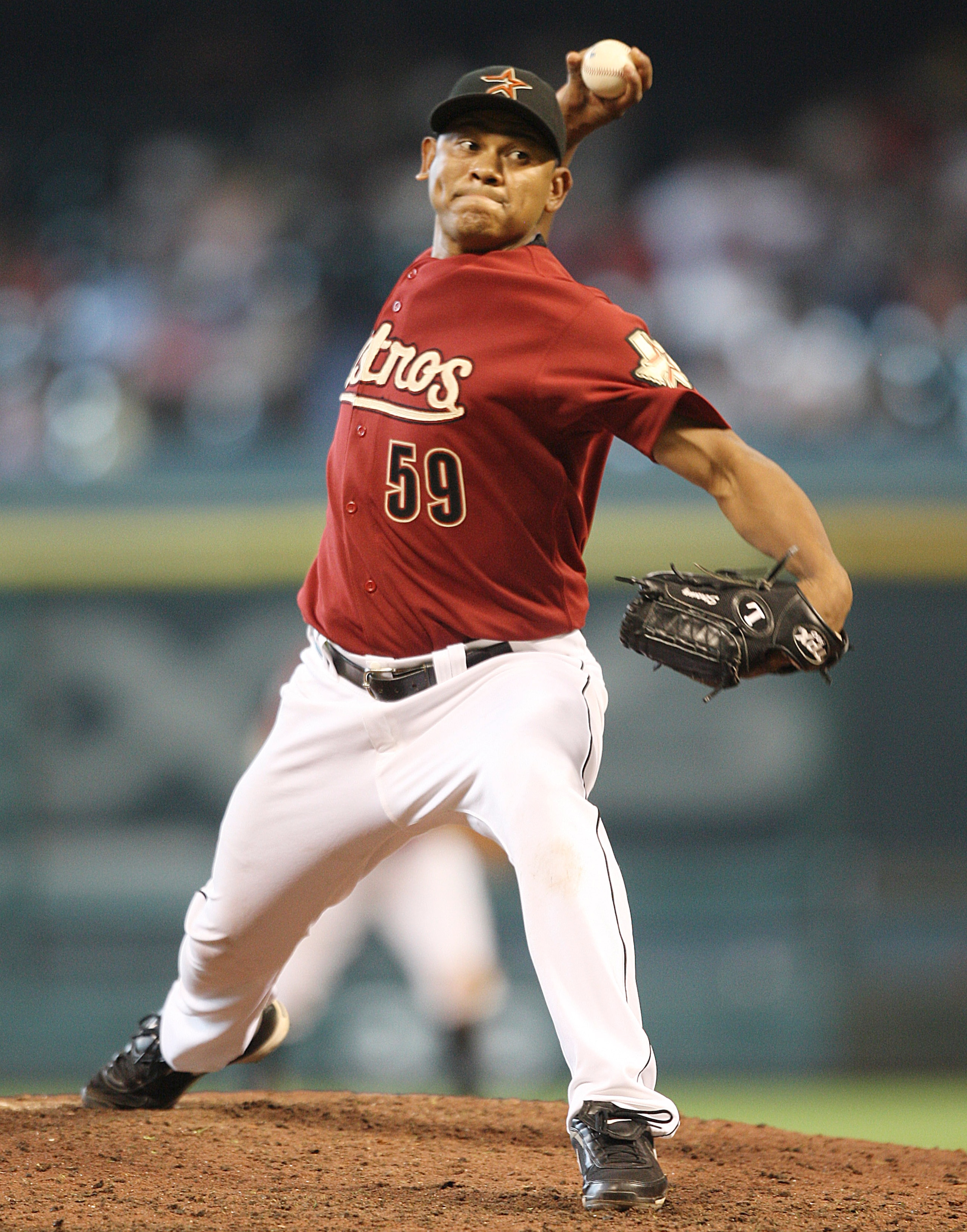 HOUSTON - JUNE 06:  Pitcher Wilton Lopez #59 of the Houston Astros throws in the seventh inning against the Chicago Cubs at Minute Maid Park on June 6, 2010 in Houston, Texas. Houston   won 6-3.  (Photo by Bob Levey/Getty Images)