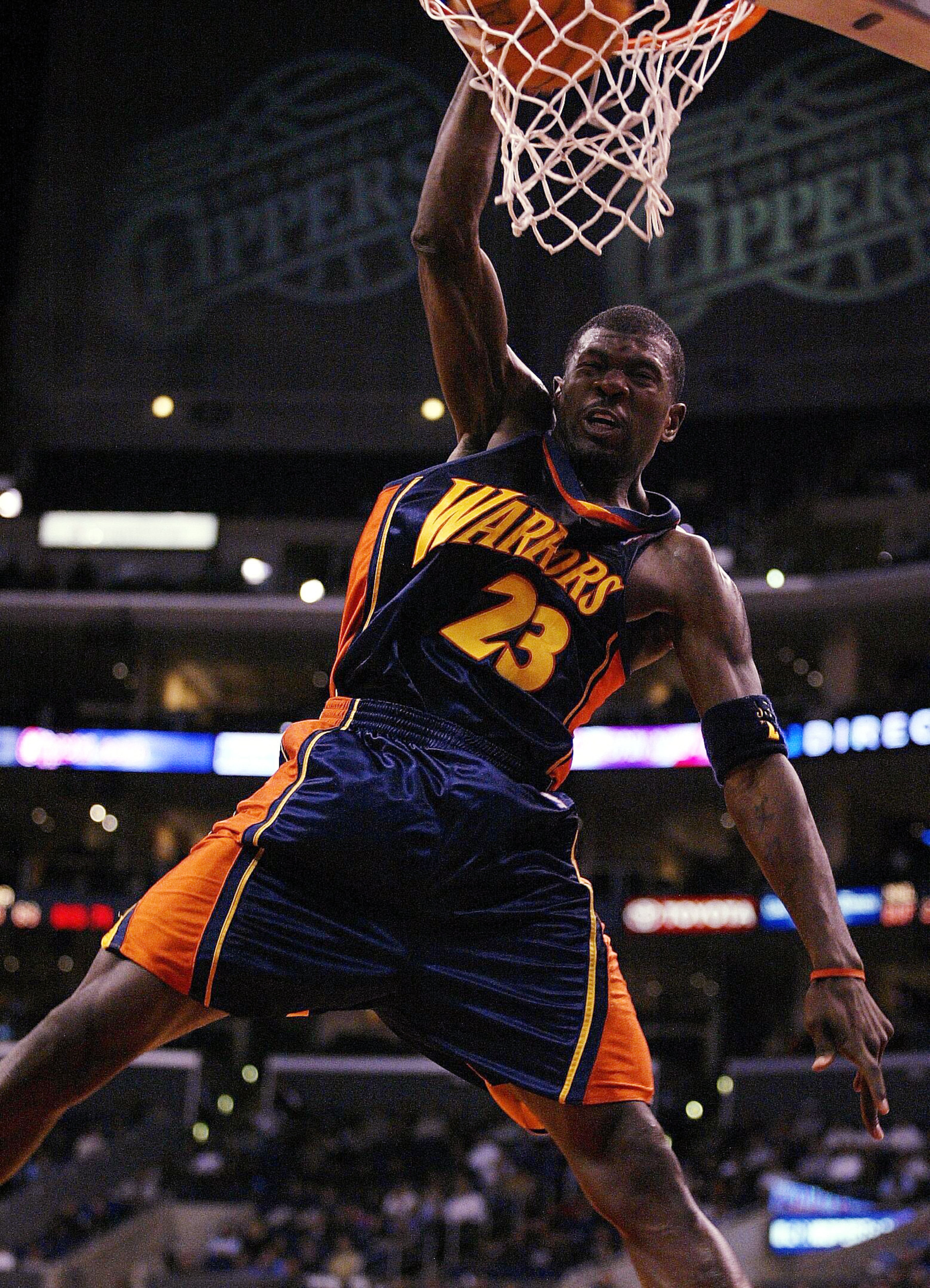 LOS ANGELES - FEBRUARY 26: Jason Richardson #23 of the Golden State Warriors dunks against the Los Angeles Clippers on February 26, 2003 at Staples Center in Los Angeles, California.  NOTE TO USER: User expressly acknowledges and agrees that, by downloadi