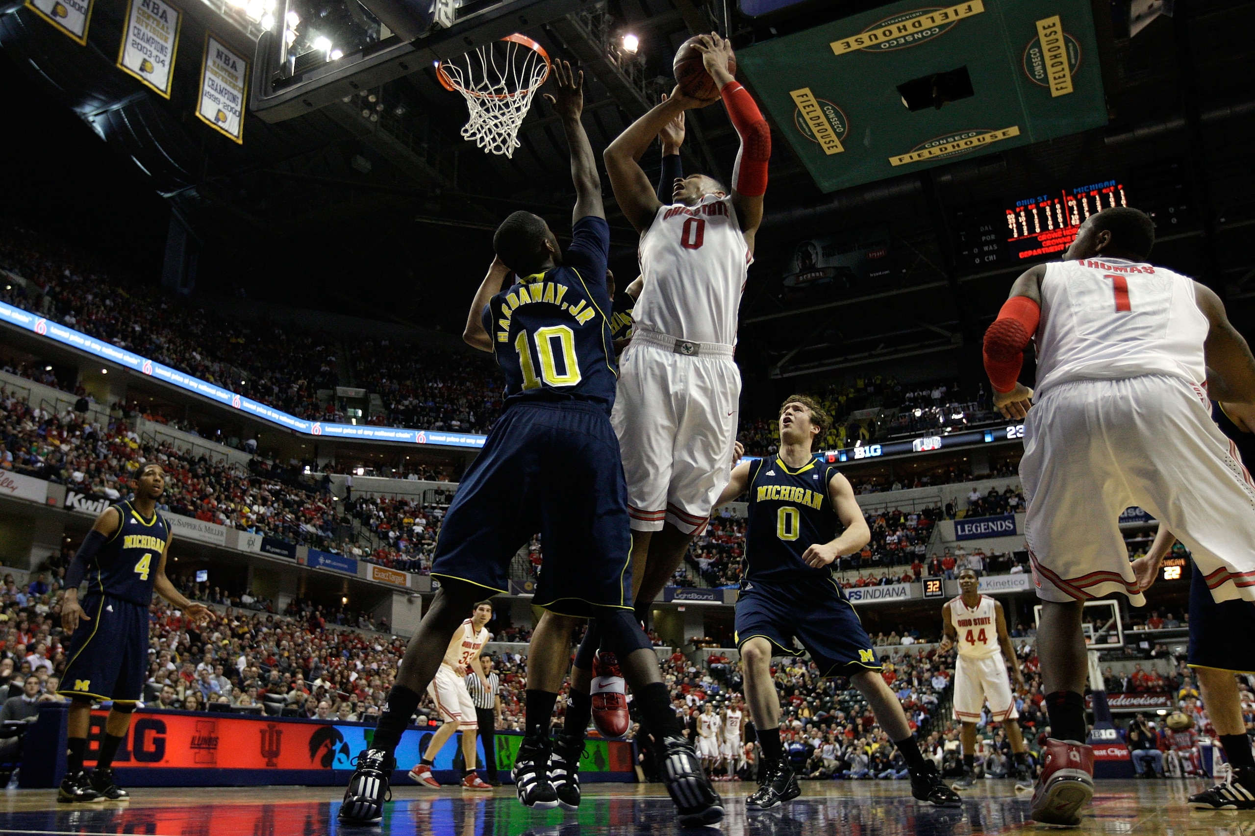 INDIANAPOLIS, IN - MARCH 12: Jared Sullinger #0 of the Ohio State Buckeyes attempts a shot in the first half against Tim Hardaway Jr. #10 of the Michigan Wolverines during the semifinals of the 2011 Big Ten Men's Basketball Tournament at Conseco Fieldhou INDIANAPOLIS, IN - MARCH 12: Jared Sullinger #0 of the Ohio State Buckeyes attempts a shot in the first half against Tim Hardaway Jr. #10 of the Michigan Wolverines during the semifinals of the 2011 Big Ten Men's Basketball Tournament at Conseco Fieldhou