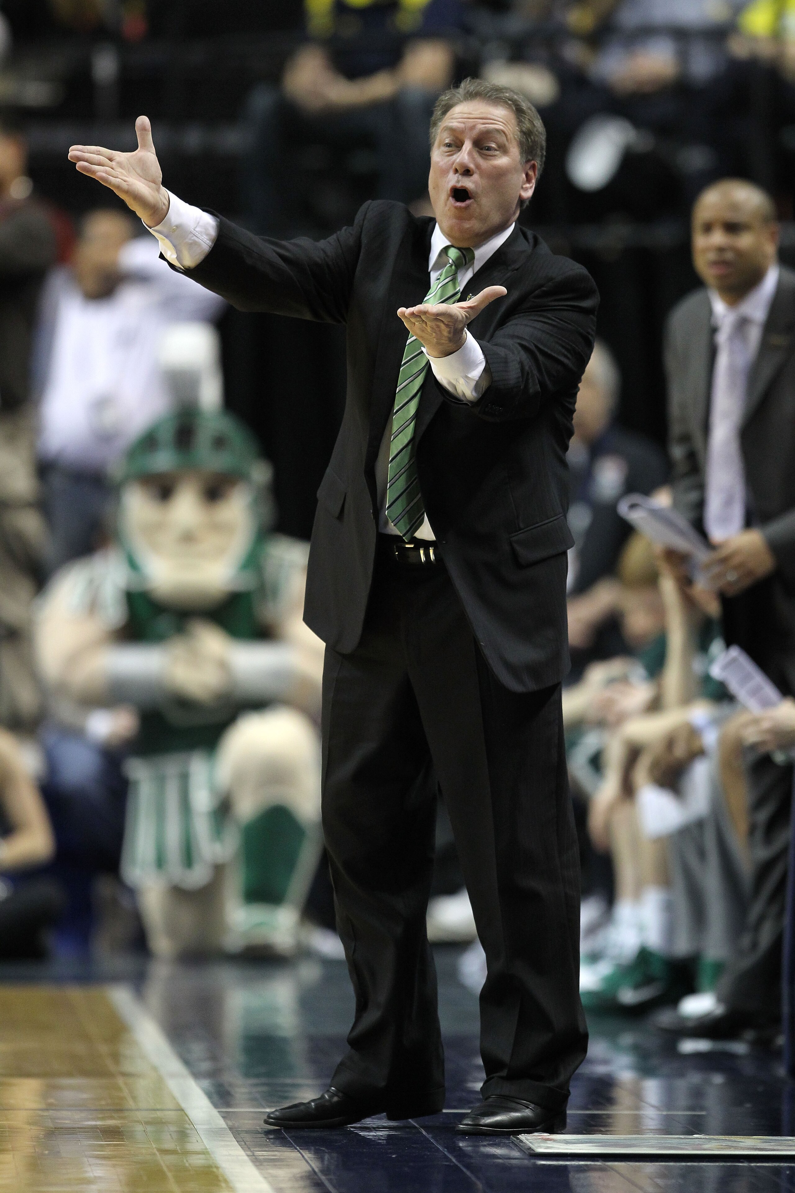 INDIANAPOLIS, IN - MARCH 11:  Head coach Tom Izzo of the Michigan State Spartans reacts against the Purdue Boilermakers during the quarterfinals of the 2011 Big Ten Men's Basketball Tournament at Conseco Fieldhouse on March 11, 2011 in Indianapolis, India