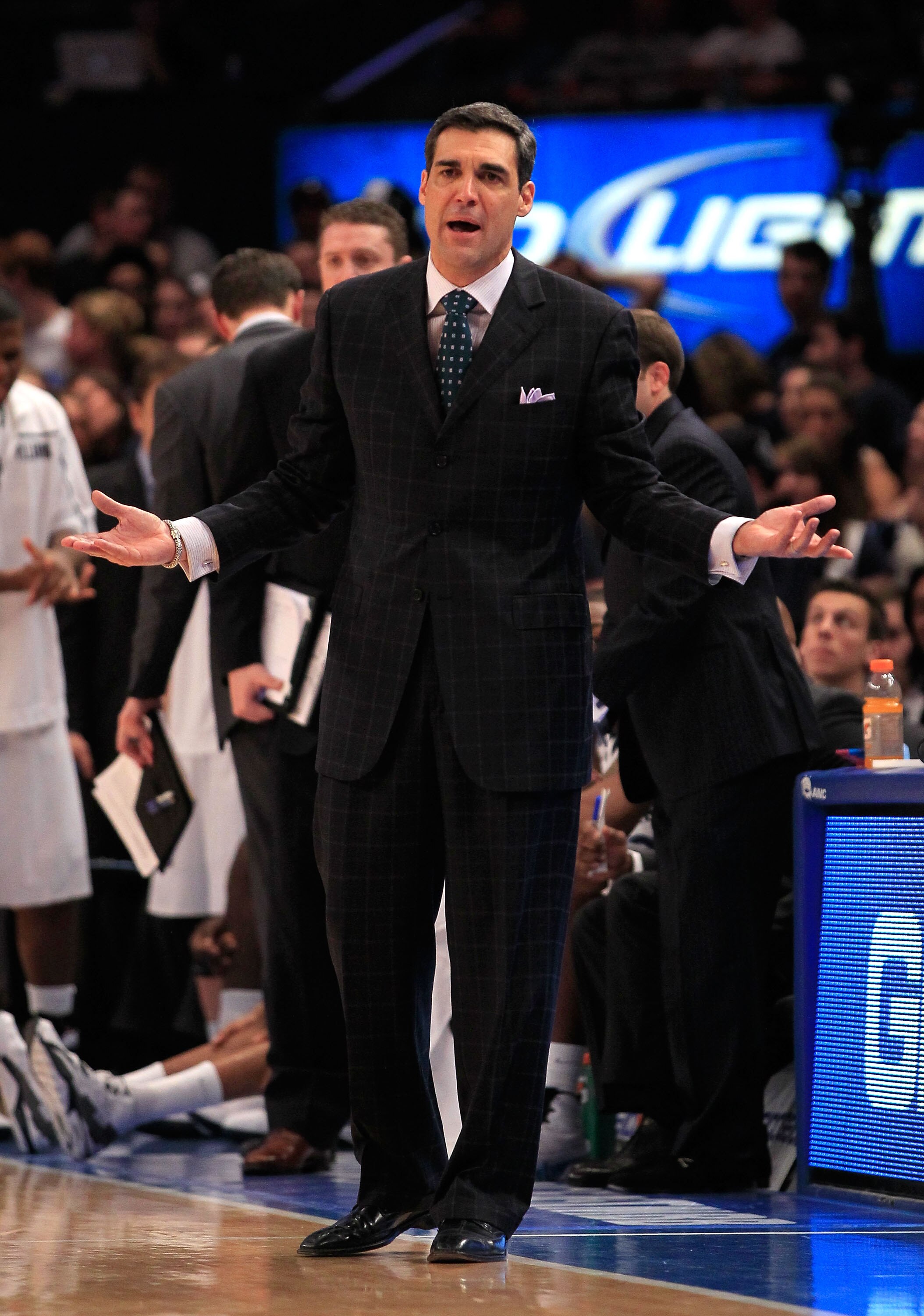 NEW YORK, NY - MARCH 08:  Head coach Jay Wright of the Villanova Wildcats gestures from the bench late in the game against the South Florida Bulls during the first round of the 2011 Big East Men's Basketball Tournament presented by American Eagle Outfitte