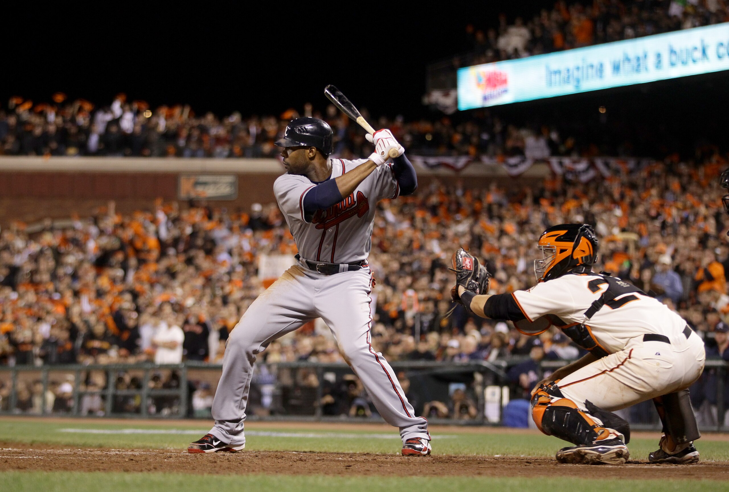 SAN FRANCISCO - OCTOBER 07:  Jason Heyward #22 of the Atlanta Braves bats against catcher Buster Posey #28 and the San Francisco Giants during game 1 of the NLDS at AT&T Park on October 7, 2010 in San Francisco, California.  (Photo by Ezra Shaw/Getty Imag
