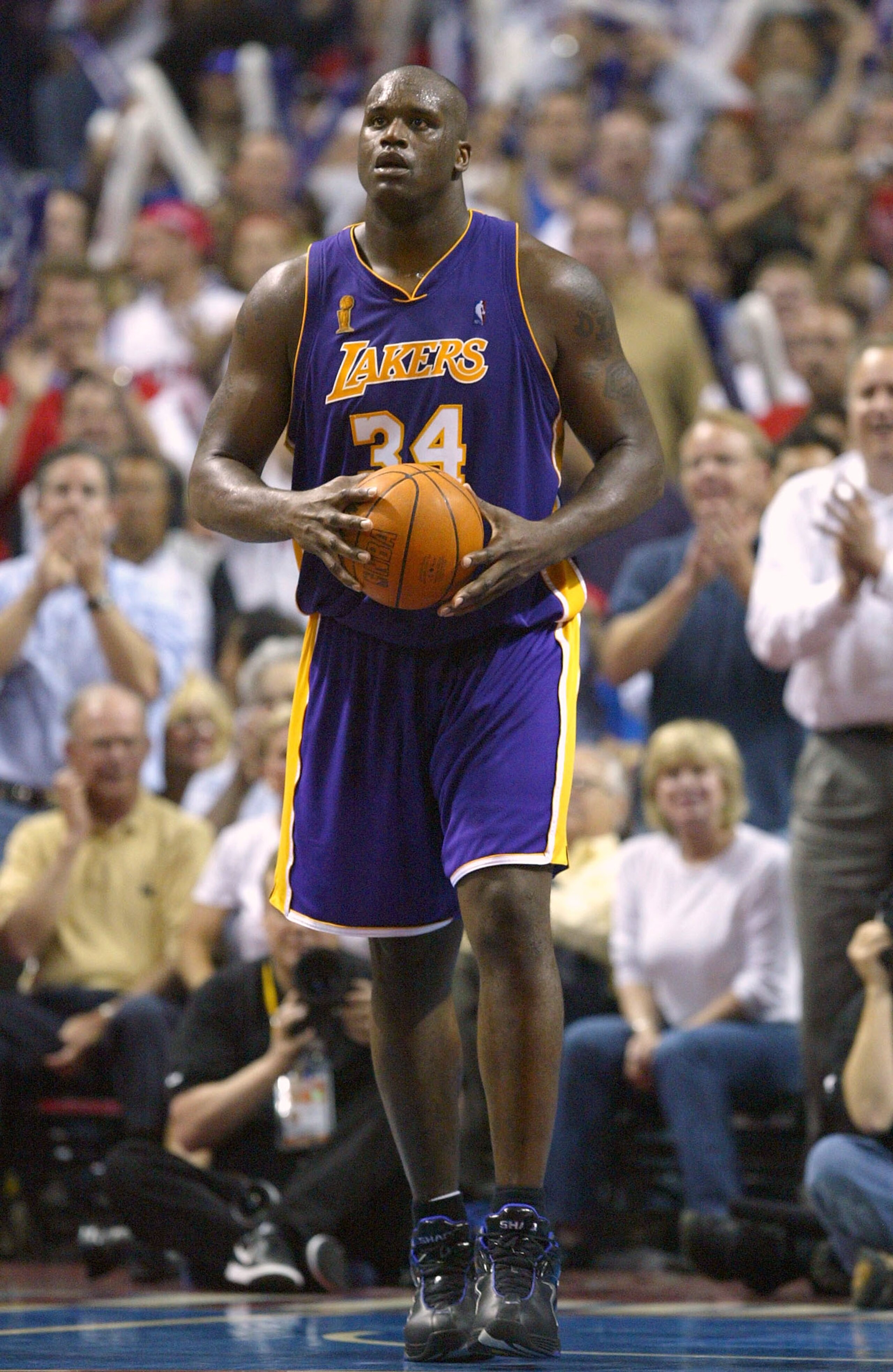 AUBURN HILLS, MI - JUNE 15: Shaquille O'Neal #34 of the Los Angeles Lakers walks upcourt in the fourth quarter of game five of the 2004 NBA Finals against the Detroit Pistons on June 15, 2004 at The Palace of Auburn Hills in Auburn Hills, Michigan. The P AUBURN HILLS, MI - JUNE 15: Shaquille O'Neal #34 of the Los Angeles Lakers walks upcourt in the fourth quarter of game five of the 2004 NBA Finals against the Detroit Pistons on June 15, 2004 at The Palace of Auburn Hills in Auburn Hills, Michigan. The P