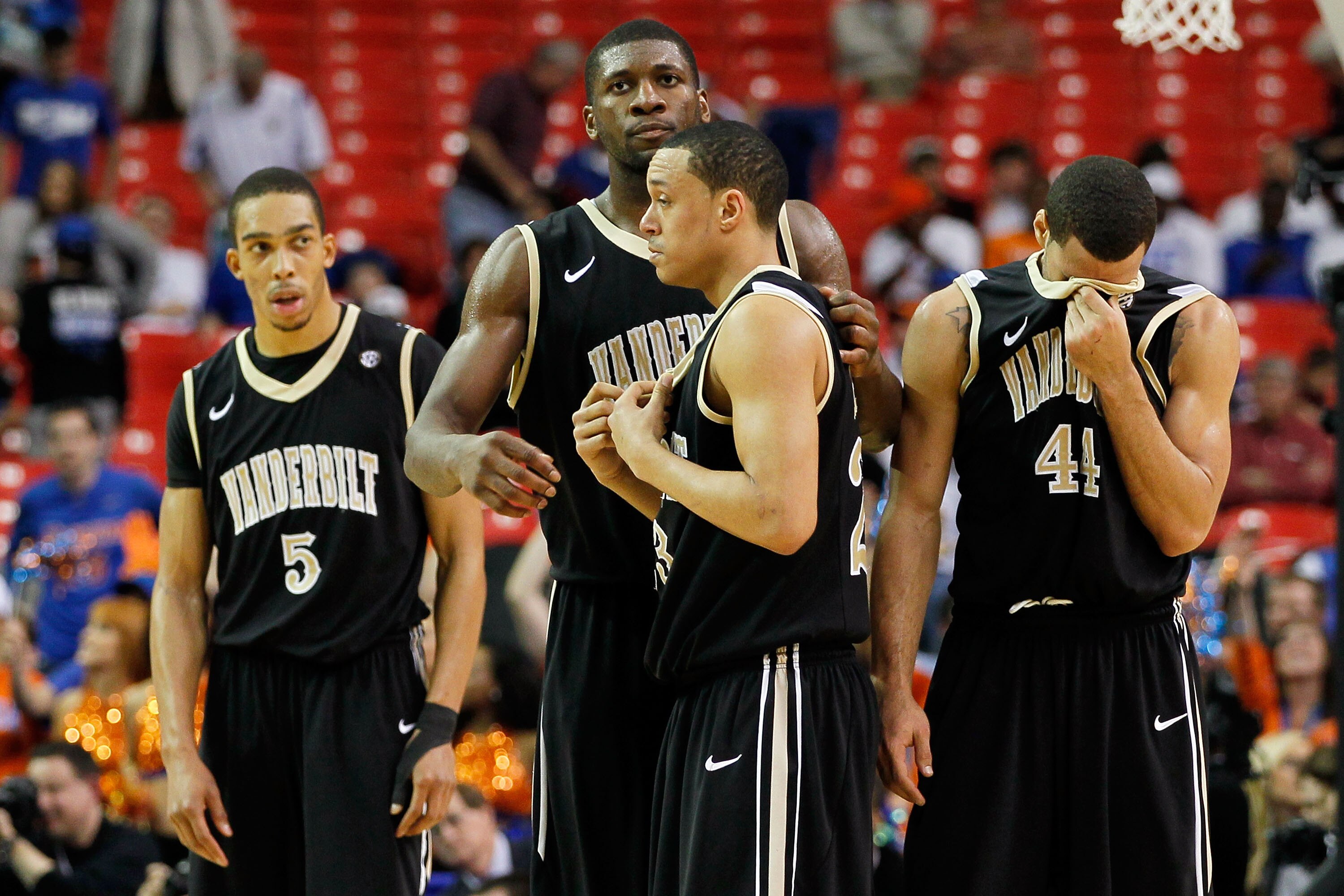 ATLANTA, GA - MARCH 12:  Lance Goulbourne #5, John Jenkins #23, Festus Ezeli #3 and Jeffery Taylor #44 of the Vanderbilt Commodores react after loosing to the Florida Gators 77 to 66 during the semifinals of the SEC Men's Basketball Tournament at Georgia