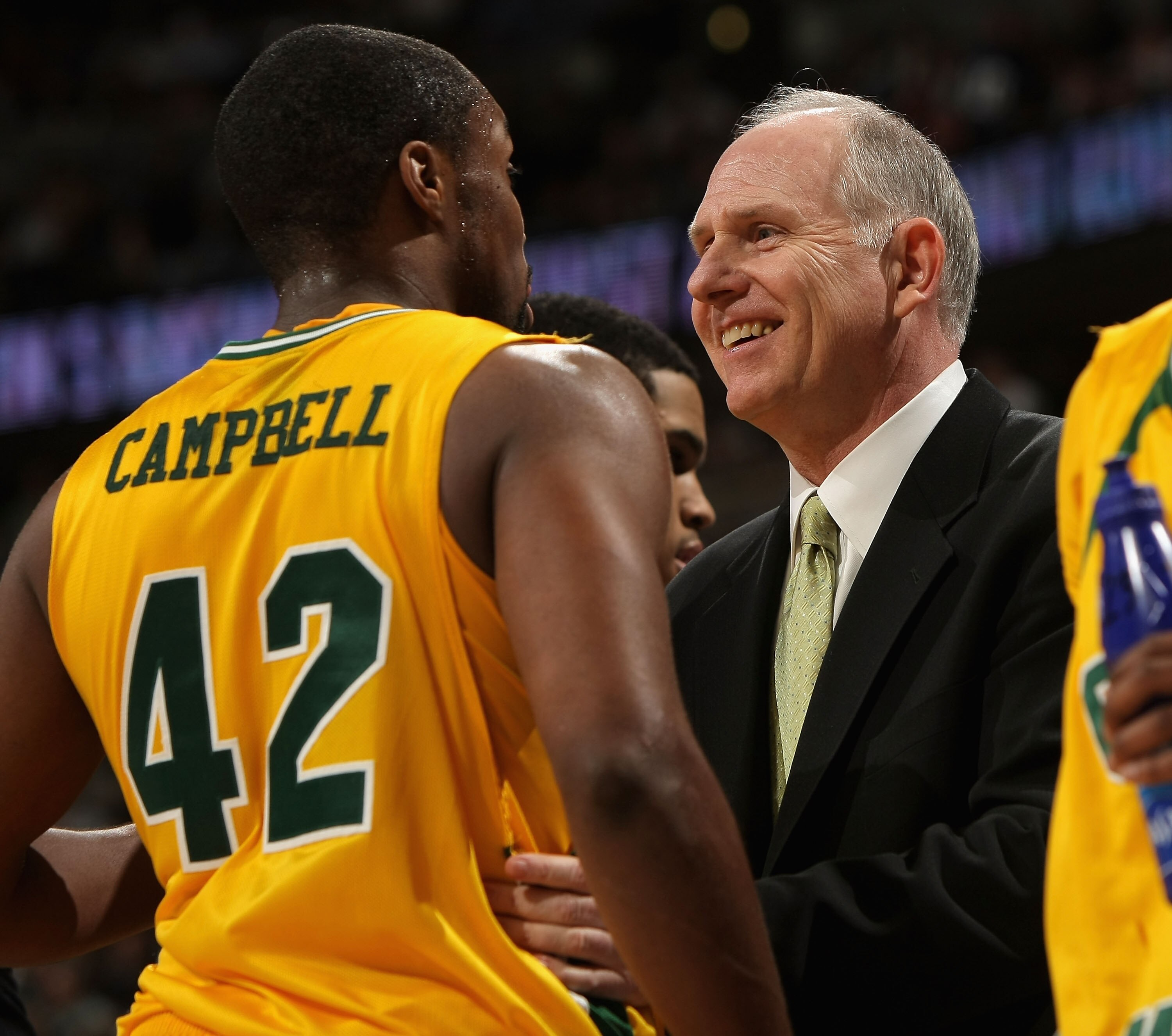 DENVER - MARCH 20:  Head coach Jim Larranaga of the George Mason Patriots talks with Folarin Campbell #42 during the first round game of the East Regional against the Notre Dame Fighting Irish as part of the 2008 NCAA Men's Basketball Tournament at Pepsi