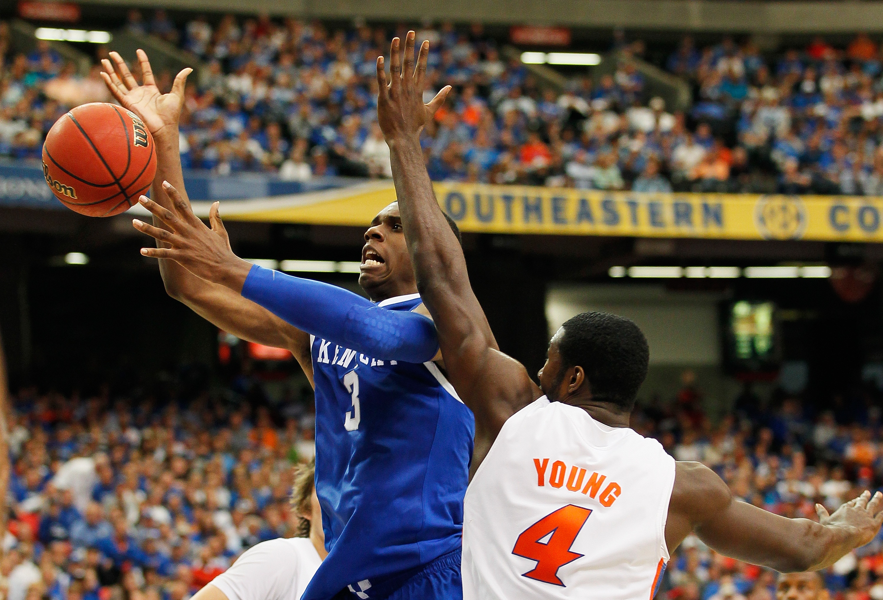 ATLANTA, GA - MARCH 13:  Terrence Jones #3 of the Kentucky Wildcats goes up against Patric Young #4 of the Florida Gators during the championship game of the SEC Men's Basketball Tournament at Georgia Dome on March 13, 2011 in Atlanta, Georgia.  (Photo by