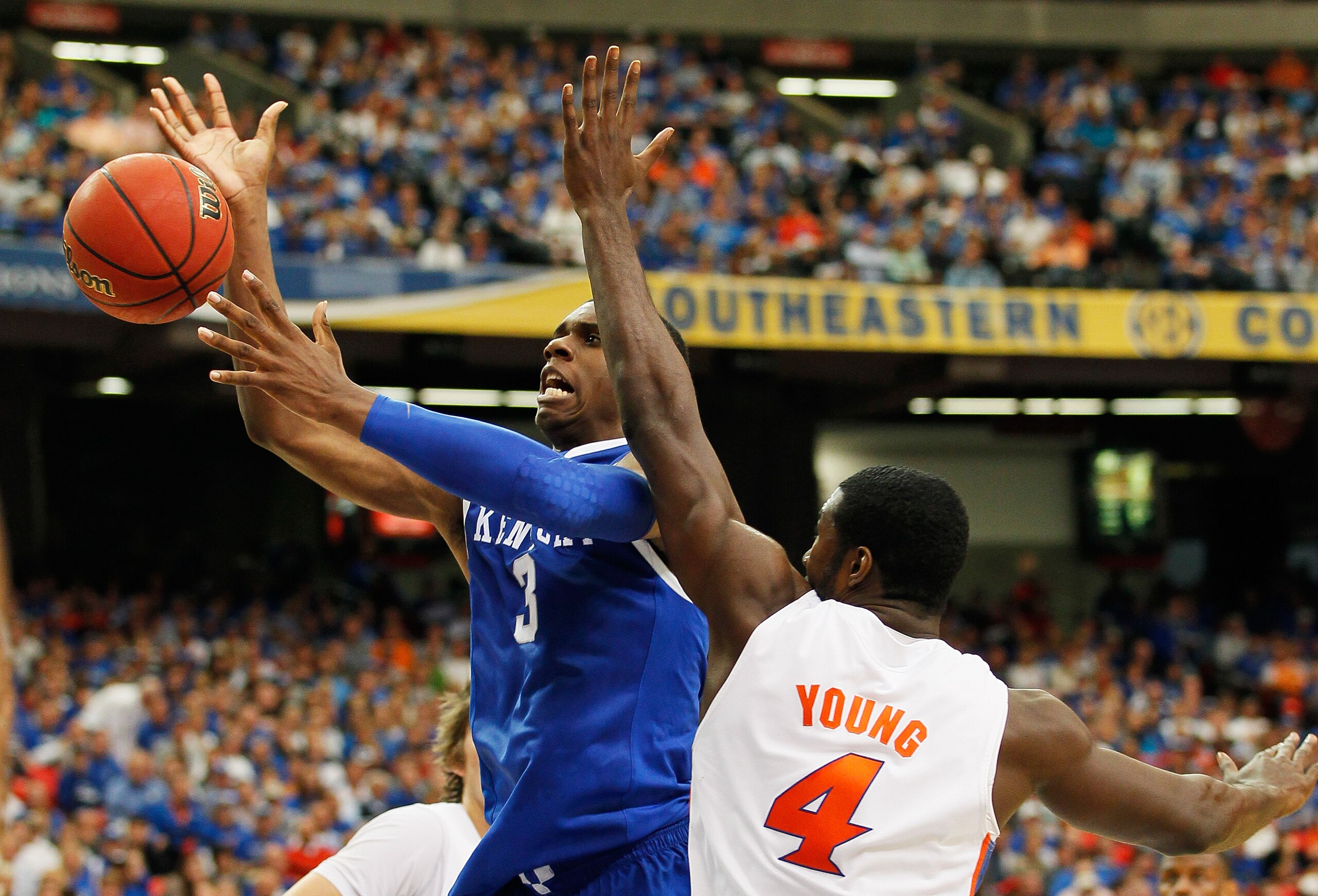ATLANTA, GA - MARCH 13: Terrence Jones #3 of the Kentucky Wildcats goes up against Patric Young #4 of the Florida Gators during the championship game of the SEC Men's Basketball Tournament at Georgia Dome on March 13, 2011 in Atlanta, Georgia. (Photo by ATLANTA, GA - MARCH 13: Terrence Jones #3 of the Kentucky Wildcats goes up against Patric Young #4 of the Florida Gators during the championship game of the SEC Men's Basketball Tournament at Georgia Dome on March 13, 2011 in Atlanta, Georgia. (Photo by