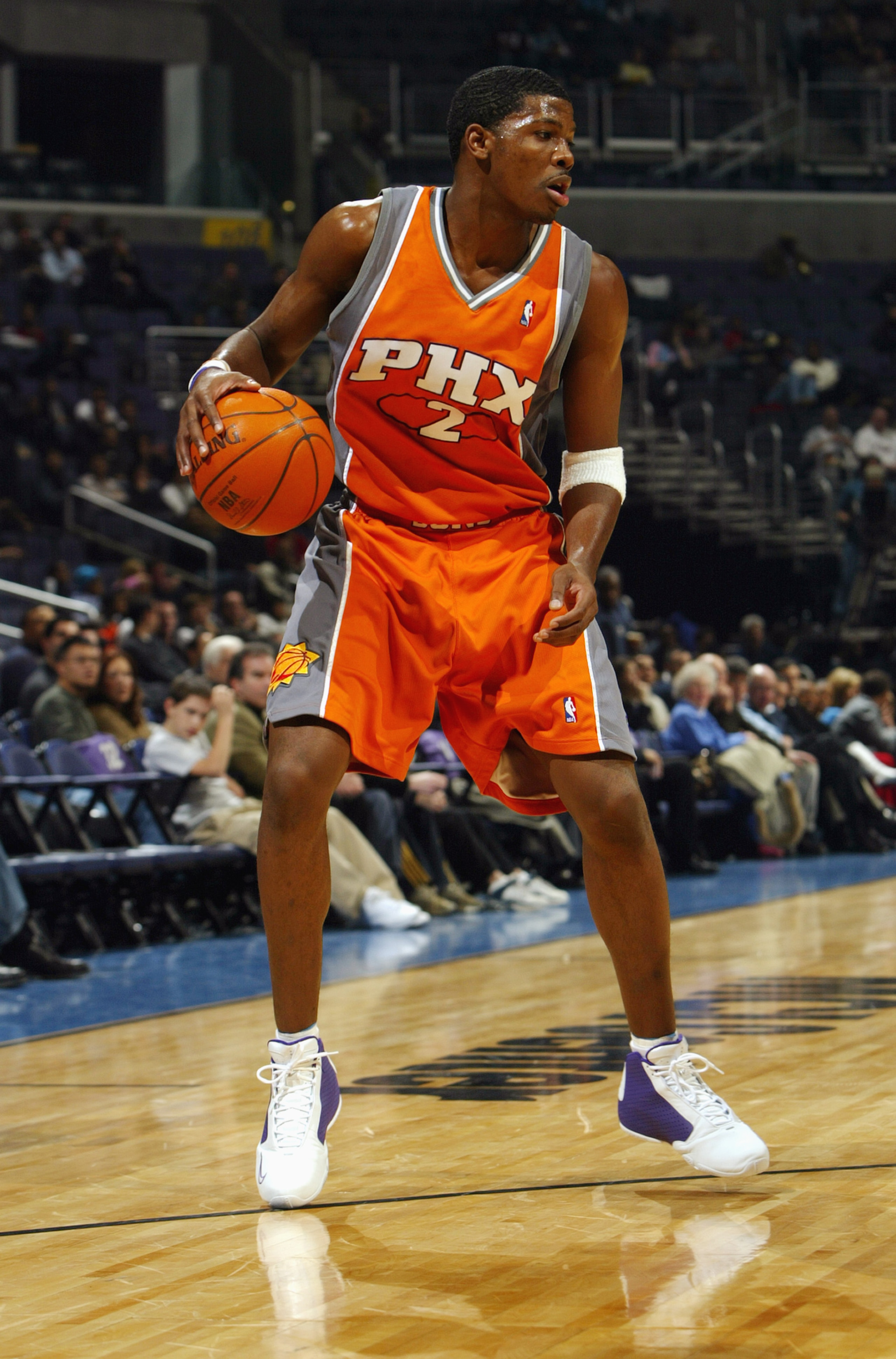 WASHINGTON - JANUARY 30: Joe Johnson #2 of the Phoenix Suns moves the ball against the Washington Wizards during the game at MCI Center on January 30, 2004 in Washington, D.C. The Wizards won 105-100. NOTE TO USER: User expressly acknowledges and agree WASHINGTON - JANUARY 30: Joe Johnson #2 of the Phoenix Suns moves the ball against the Washington Wizards during the game at MCI Center on January 30, 2004 in Washington, D.C. The Wizards won 105-100. NOTE TO USER: User expressly acknowledges and agree