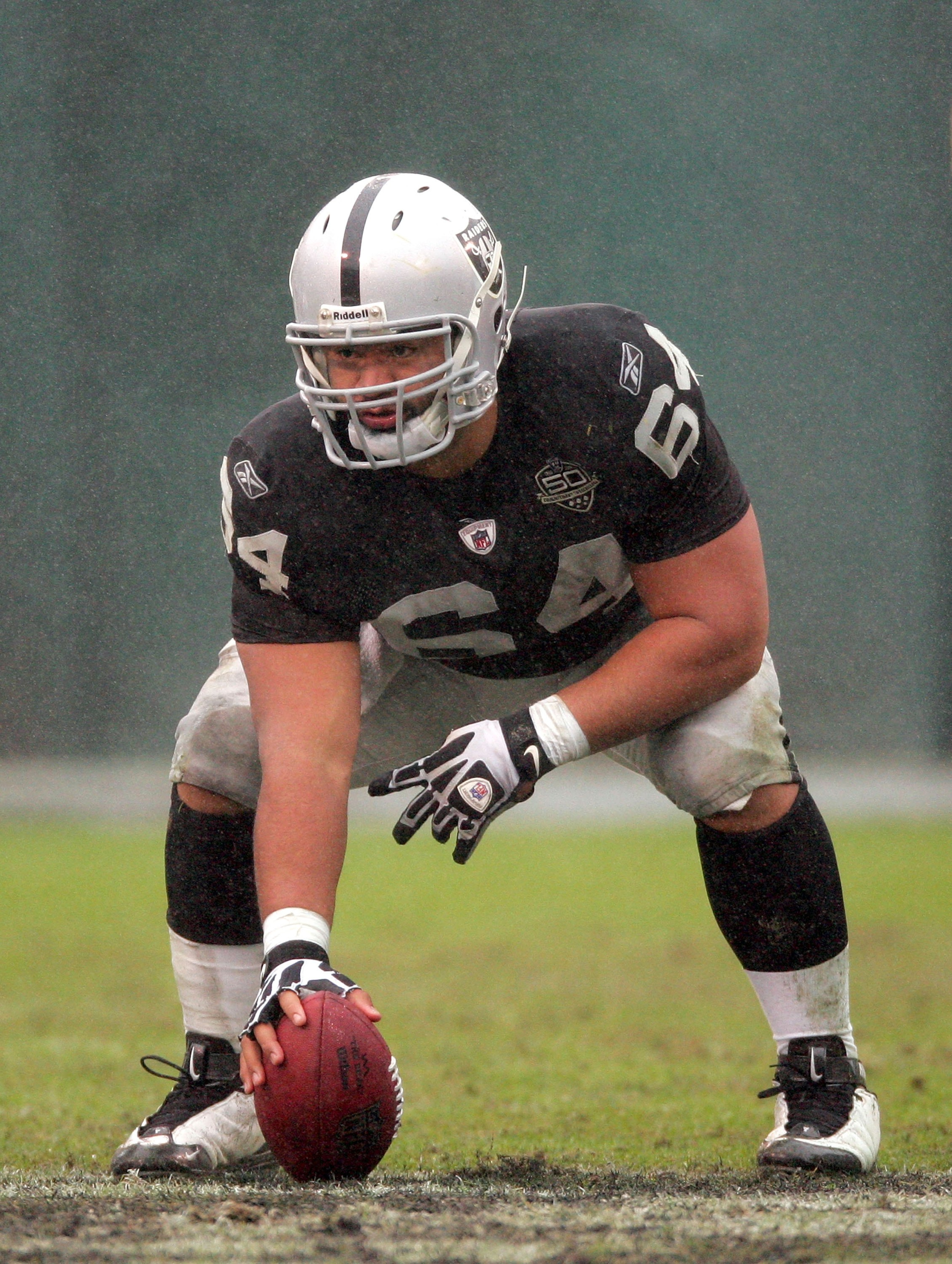 OAKLAND, CA - DECEMBER 13: Samson Satele #64 of the Oakland Raiders gets set to snap the ball during their game against the Washington Redskins at Oakland-Alameda County Coliseum on December 13, 2009 in Oakland, California. (Photo by Ezra Shaw/Getty Imag OAKLAND, CA - DECEMBER 13: Samson Satele #64 of the Oakland Raiders gets set to snap the ball during their game against the Washington Redskins at Oakland-Alameda County Coliseum on December 13, 2009 in Oakland, California. (Photo by Ezra Shaw/Getty Imag