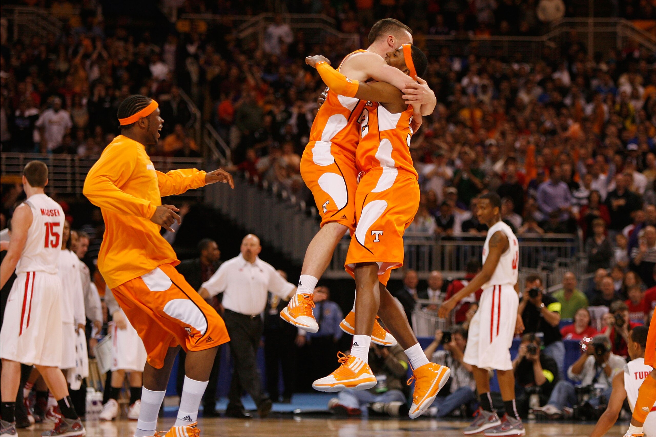 ST. LOUIS - MARCH 26: Steven Pearl #22 and Scotty Hopson #32 both of the Tennessee Volunteers celebrate their victory over the Ohio State Buckeyes during the midwest regional semifinal of the 2010 NCAA men's basketball tournament at the Edward Jones Dome