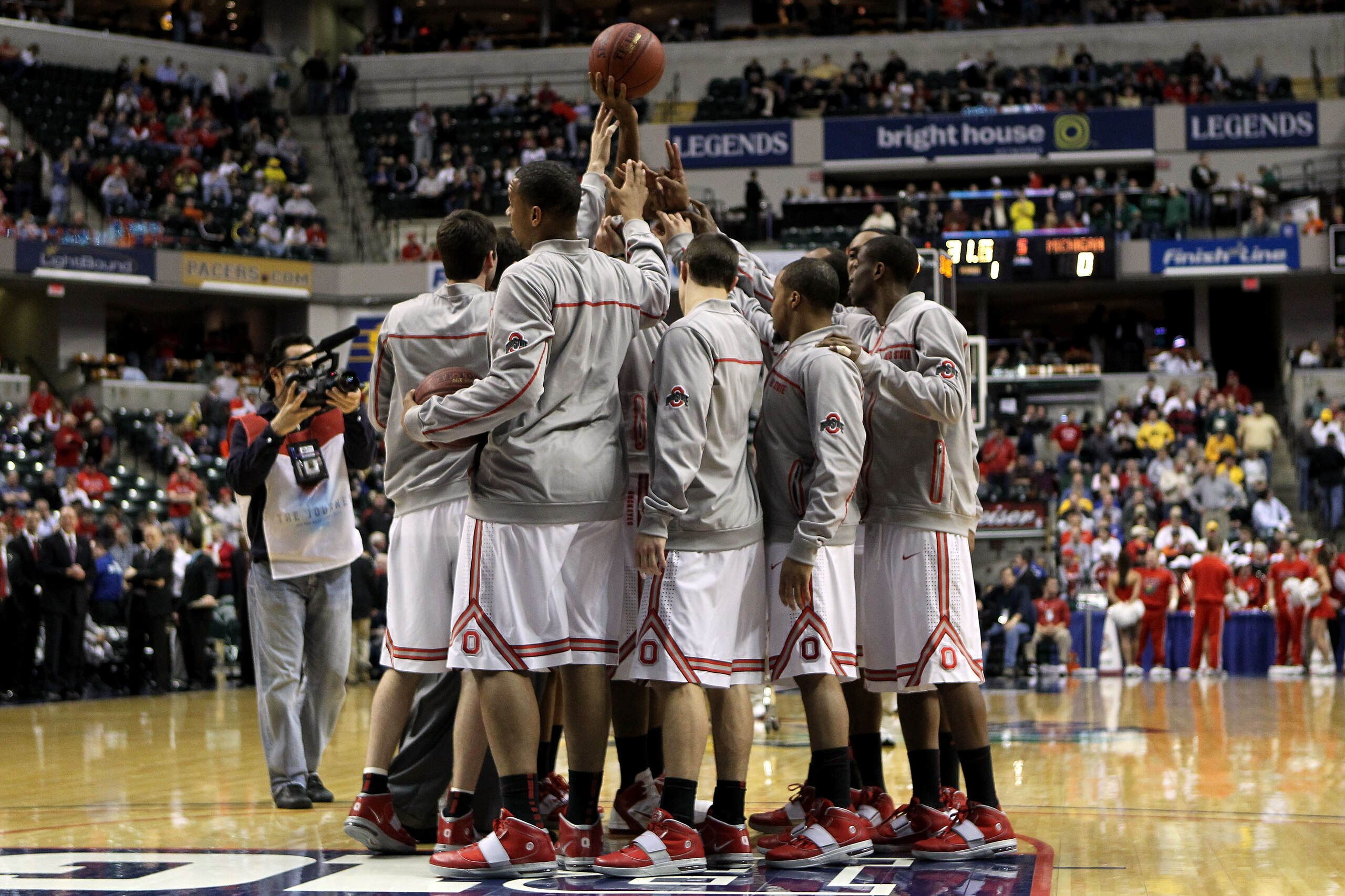 INDIANAPOLIS, IN - MARCH 12:  The Ohio State Buckeyes huddle up prior to playing against the Michigan Wolverines during the semifinals of the 2011 Big Ten Men's Basketball Tournament at Conseco Fieldhouse on March 12, 2011 in Indianapolis, Indiana.  (Phot
