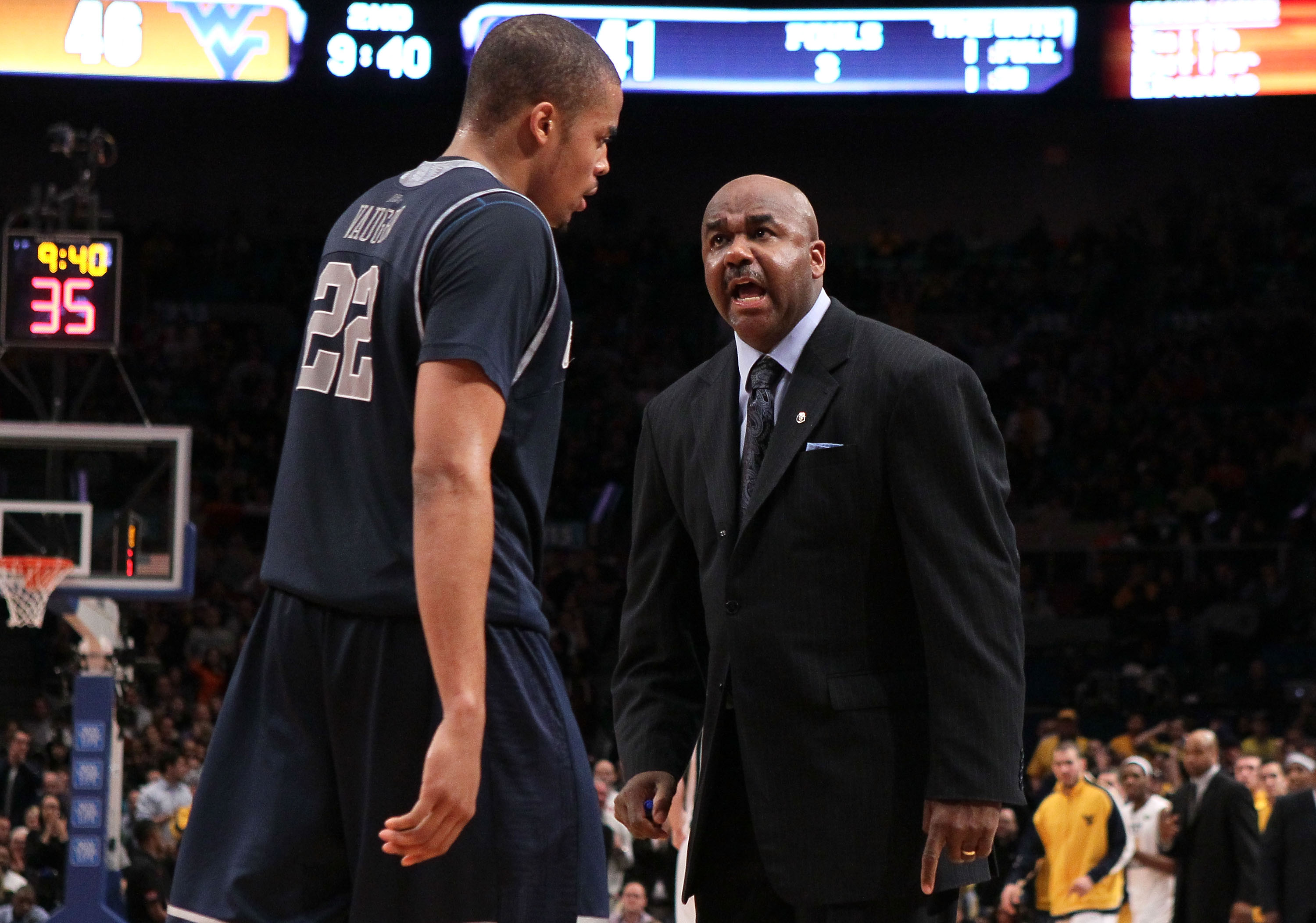 NEW YORK - MARCH 13: Head coach John Thompson III of the Georgetown Hoyas talks to Julian Vaughn #22 during the game against the West Virginia Mountaineers during the championship of the 2010 NCAA Big East Tournament at Madison Square Garden on March 13,