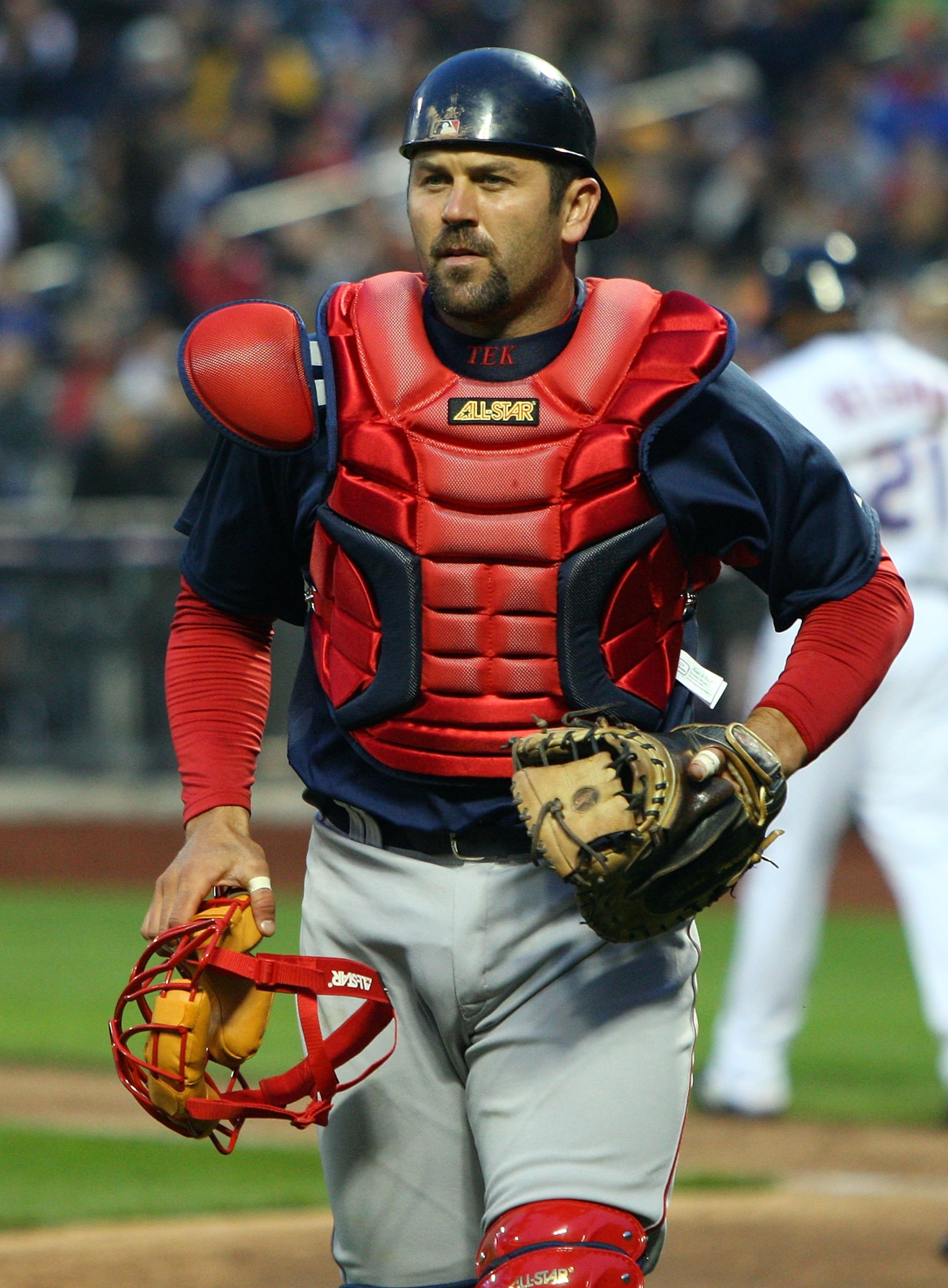 NEW YORK - APRIL 03:  Jason Varitek #33 of the Boston Red Sox runs off the field against the New York Mets on April 3, 2009 at Citi Field in the Flushing neighborhood of the Queens borough of New York City. The game marks the first time the Mets play in t