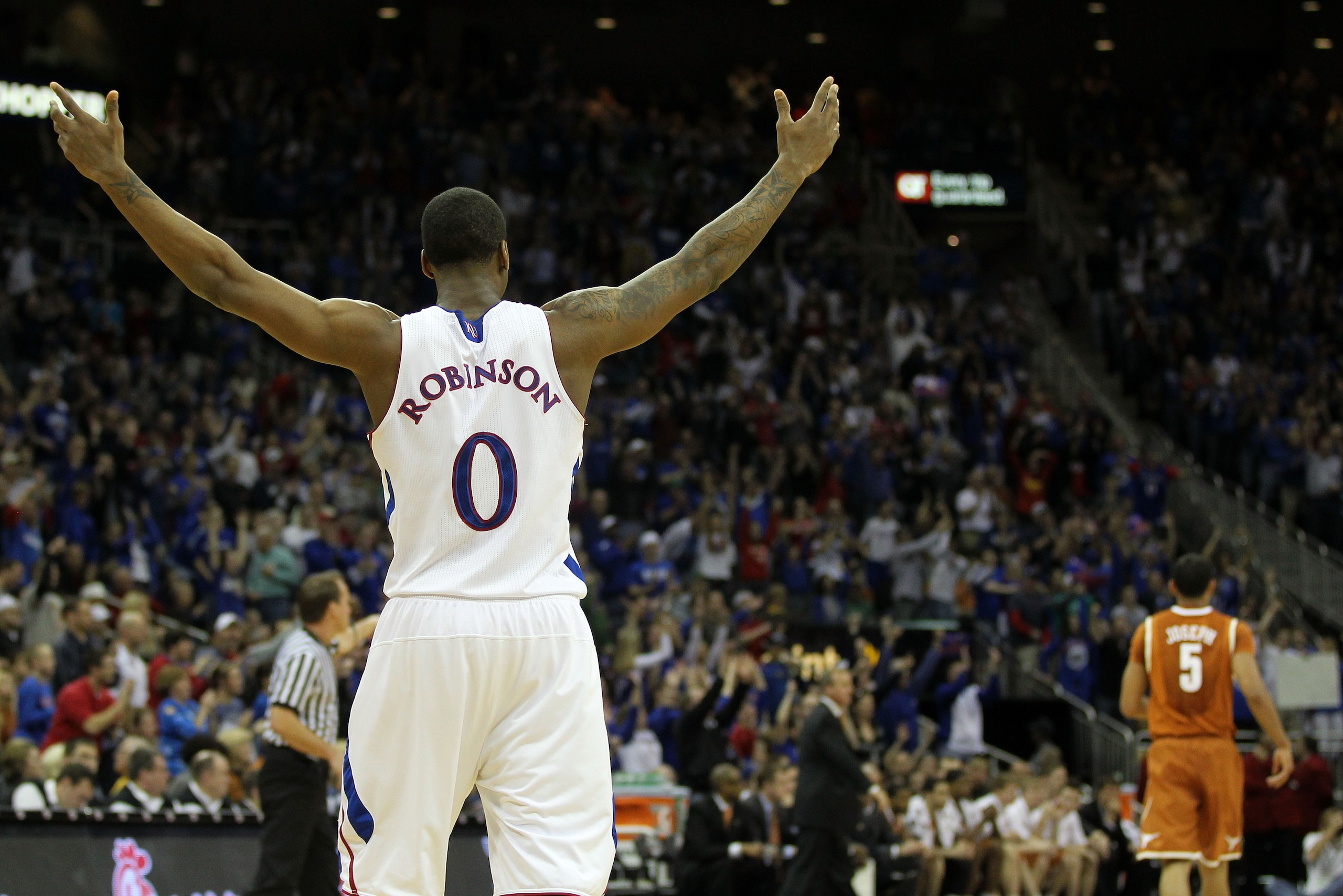 KANSAS CITY, MO - MARCH 12:  Thomas Robinson #0 of the Kansas Jayhawks reacts after a play against the Texas Longhorns during the 2011 Phillips 66 Big 12 Men's Basketball Tournament championship game at Sprint Center on March 12, 2011 in Kansas City, Miss
