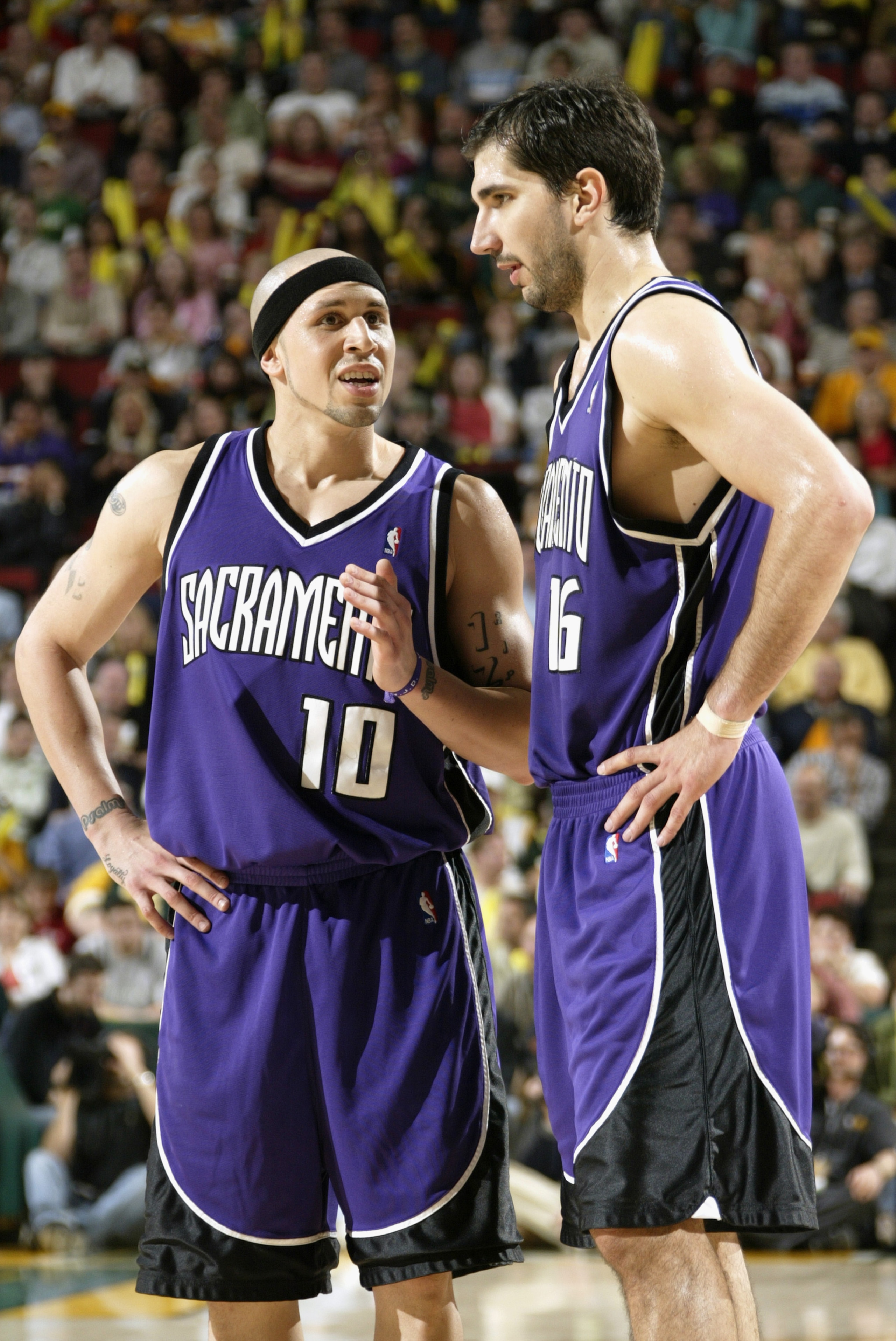 SEATTLE - MAY 3: Mike Bibby #10 of the Sacramento Kings talks to his teammate Peja Stojakovic #16 in Game five of the Western Conference Quarterfinals against the Seattle Sonics during the 2005 NBA Playoffs at Key Arena on May 3, 2005 in Seattle, Washing SEATTLE - MAY 3: Mike Bibby #10 of the Sacramento Kings talks to his teammate Peja Stojakovic #16 in Game five of the Western Conference Quarterfinals against the Seattle Sonics during the 2005 NBA Playoffs at Key Arena on May 3, 2005 in Seattle, Washing