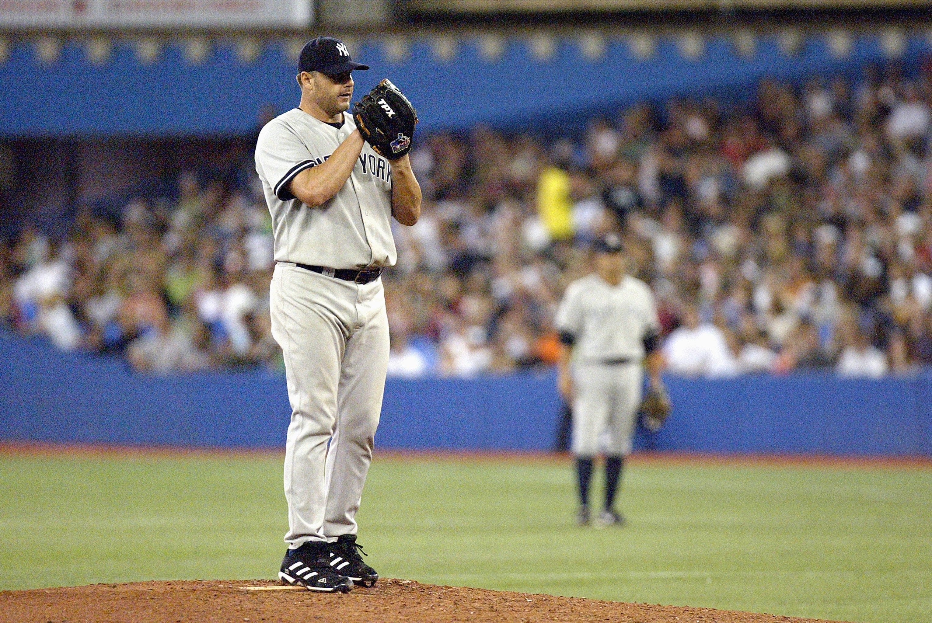 TORONTO - AUGUST 7:  Roger Clemens #22 of the New York Yankees linesup the pitch during the game against the Toronto Blue Jays at the Rogers Centre August 7, 2007 in Toronto, Ontario.(Photo By Dave Sandford/Getty Images)