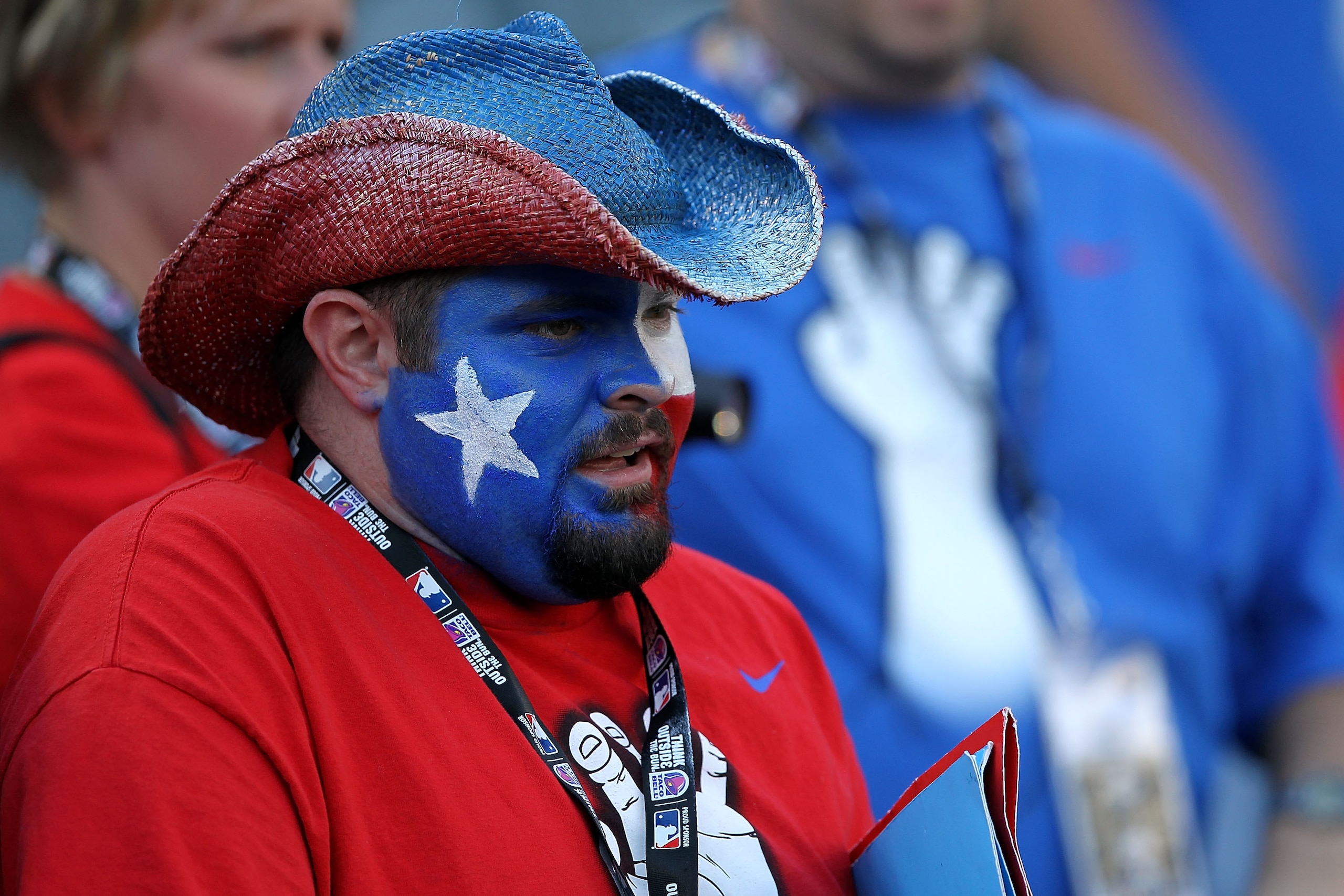 ARLINGTON, TX - NOVEMBER 01:  A fan of the Texas Rangers looks on during batting practice against the San Francisco Giants in Game Five of the 2010 MLB World Series at Rangers Ballpark in Arlington on November 1, 2010 in Arlington, Texas.  (Photo by Ronal