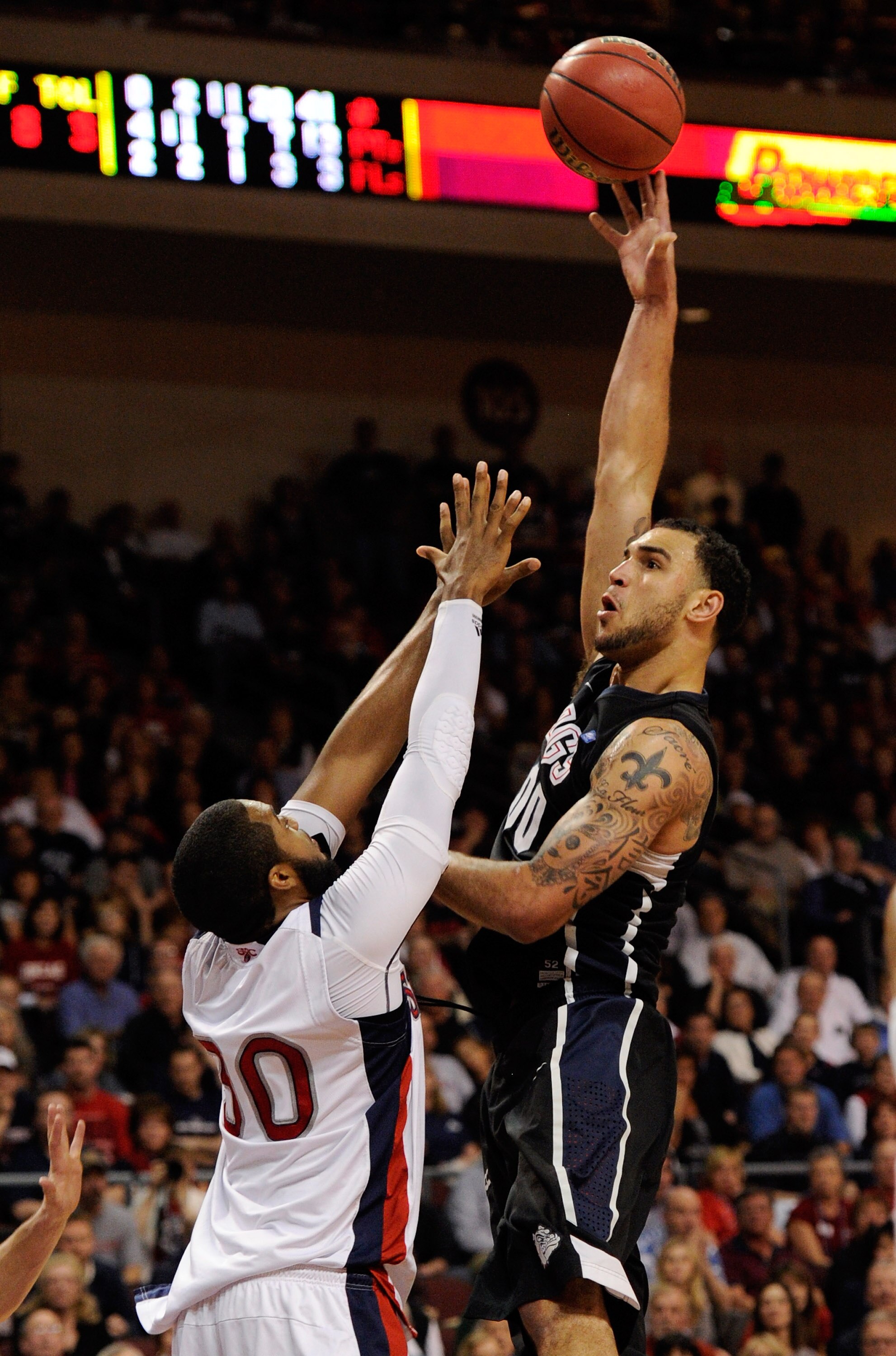 LAS VEGAS, NV - MARCH 07:  Robert Sacre #00 of the Gonzaga Bulldogs shoots against Kenton Walker II #30 of the Saint Mary's Gaels during the championship game of the Zappos.com West Coast Conference Basketball tournament at the Orleans Arena March 7, 2011