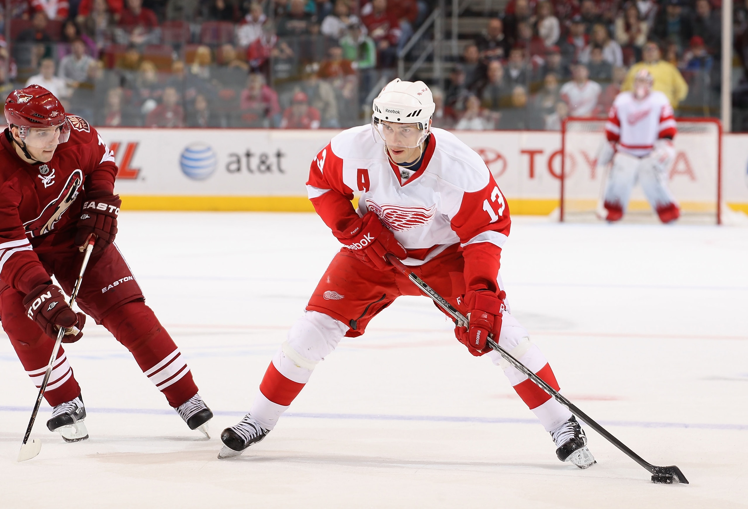 GLENDALE, AZ - MARCH 05:  Pavel Datsyuk #13 of the Detroit Red Wings skates with the puck during the NHL game against the Phoenix Coyotes at Jobing.com Arena on March 5, 2011 in Glendale, Arizona. The Coyotes defeated the Red Wings 5-4 in an overtime shoo
