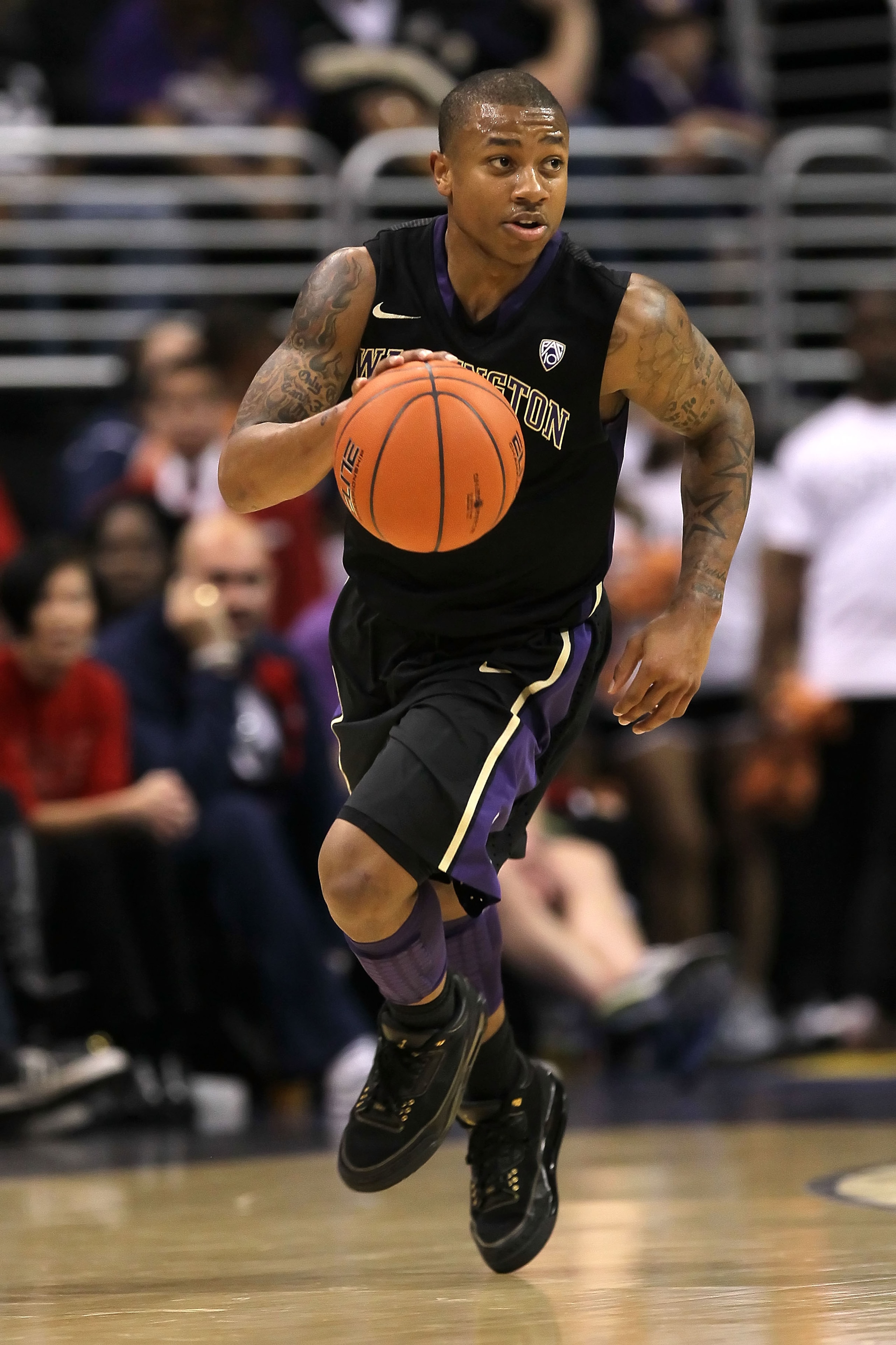 LOS ANGELES, CA - MARCH 12:  Isaiah Thomas #2 of the Washington Huskies moves the ball while taking on the Arizona Wildcats in the championship game of the 2011 Pacific Life Pac-10 Men's Basketball Tournament at Staples Center on March 12, 2011 in Los Ang