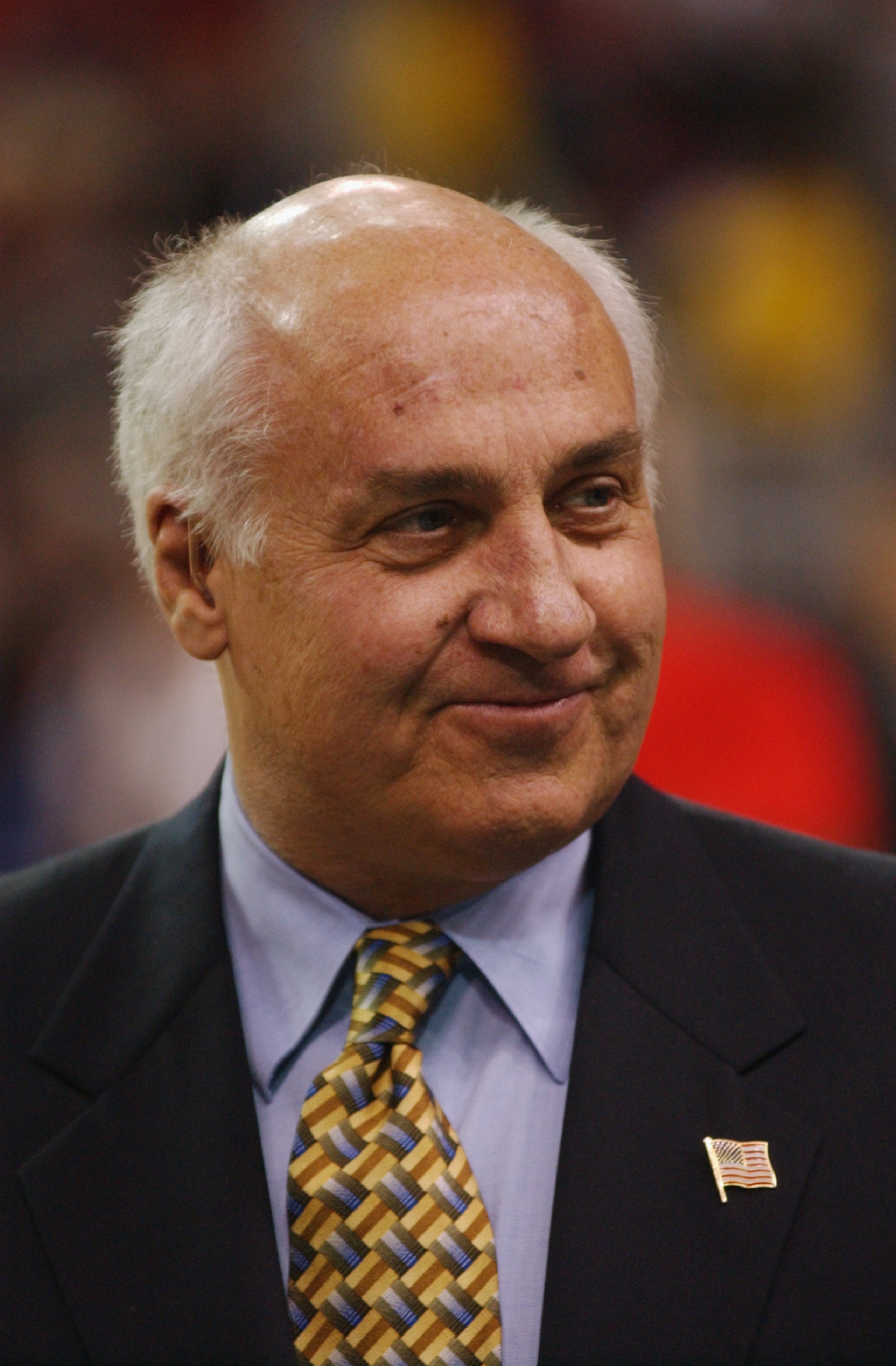 ATLANTA - MARCH 30:  Billy Packer of CBS Sports stands on the court during the semifinal round of the NCAA Men's Final Four between the Indiana Hoosiers and the Oklahoma Sooners on March 30, 2002 at the Georgia Dome in Atlanta, Georgia.  Indiana defeated