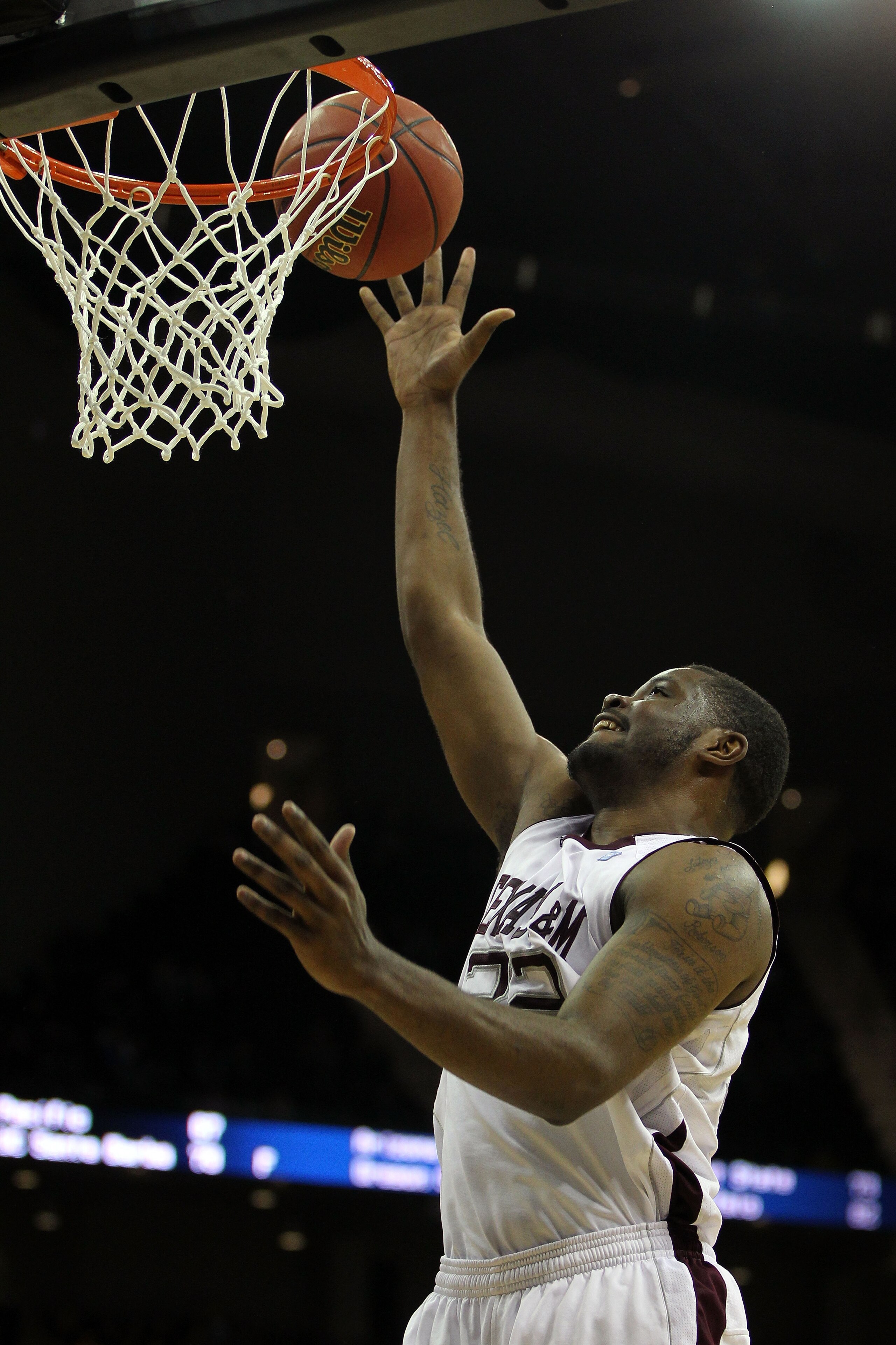KANSAS CITY, MO - MARCH 10:  Khris Middleton #22 of the Texas A&M Aggies goes up for a shot against the Missouri Tigers during their quarterfinal game in the 2011 Phillips 66 Big 12 Men's Basketball Tournament at Sprint Center on March 10, 2011 in Kansas