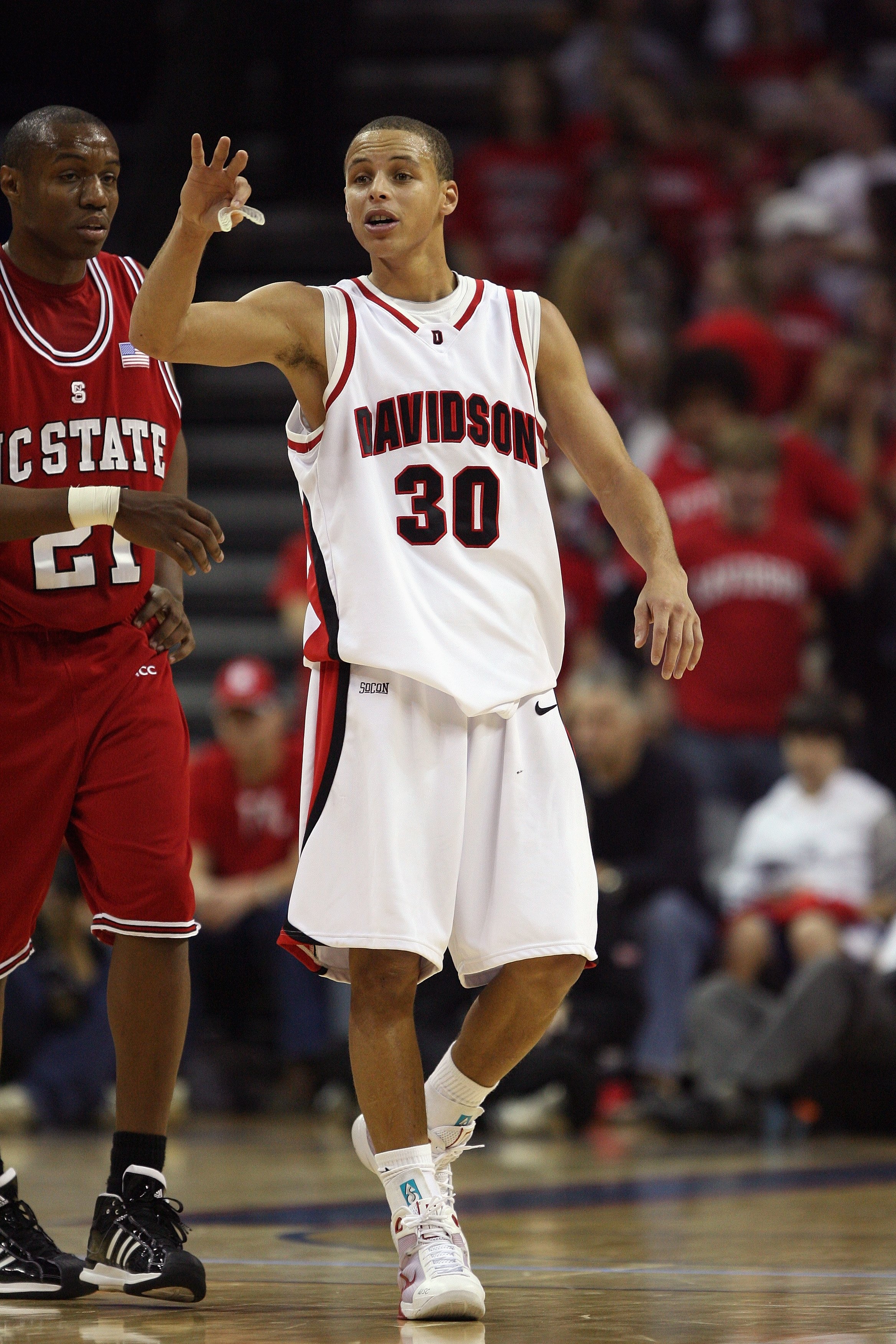 CHARLOTTE, NC - DECEMBER 6:  Stephen Curry #30 of the Davidson Wildcats walks upcourt during the game against the North Carolina State Wolfpack at Time Warner Cable Arena on December 6, 2008 in Charlotte, North Carolina. (Photo by Streeter Lecka/Getty Ima