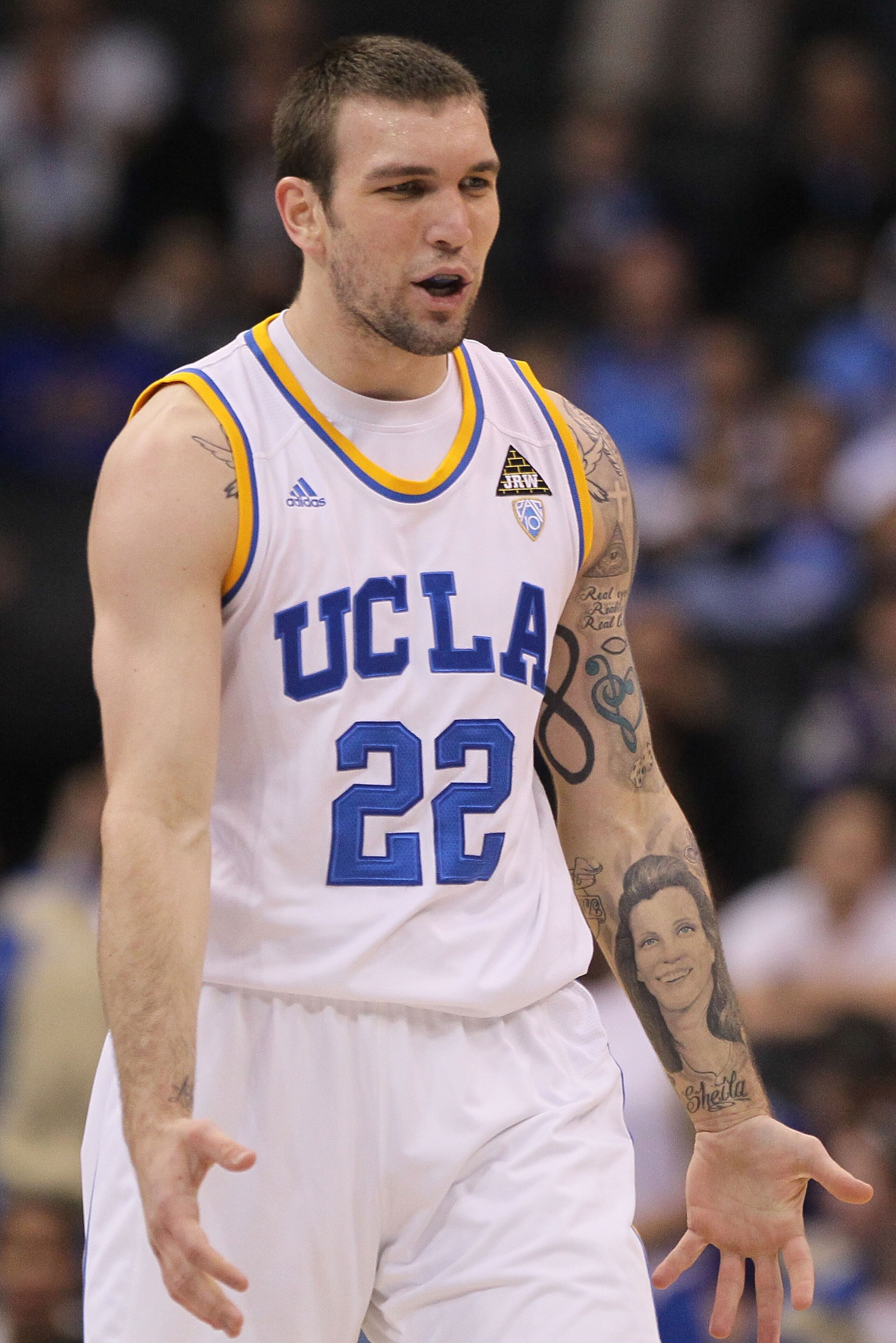 LOS ANGELES, CA - MARCH 10: Reeves Nelson #22 of the UCLA Bruins reacts in the second half while taking on the Oregon Ducks in the quarterfinals of the 2011 Pacific Life Pac-10 Men's Basketball Tournament at Staples Center on March 10, 2011 in Los Angele LOS ANGELES, CA - MARCH 10: Reeves Nelson #22 of the UCLA Bruins reacts in the second half while taking on the Oregon Ducks in the quarterfinals of the 2011 Pacific Life Pac-10 Men's Basketball Tournament at Staples Center on March 10, 2011 in Los Angele