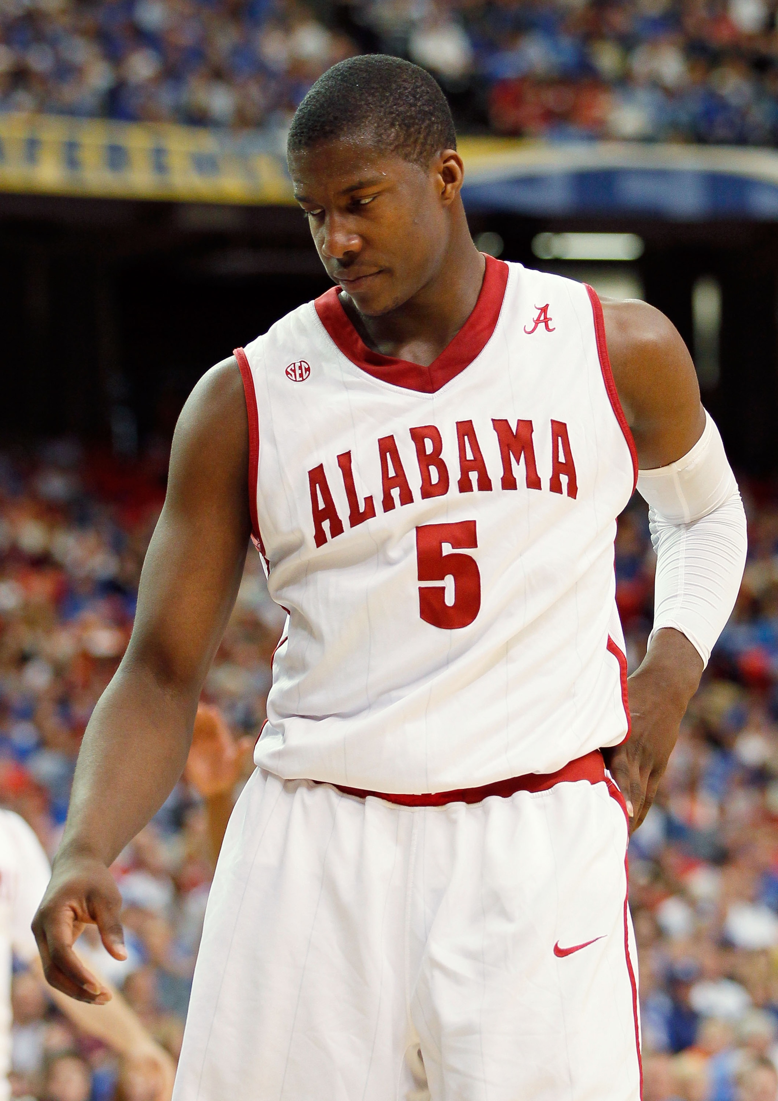 ATLANTA, GA - MARCH 12:  Tony Mitchell #5 of the Alabama Crimson Tide reacts during their 58 to 72 loss to the Kentucky Wildcats in the semifinals of the SEC Men's Basketball Tournament at Georgia Dome on March 12, 2011 in Atlanta, Georgia.  (Photo by Kev