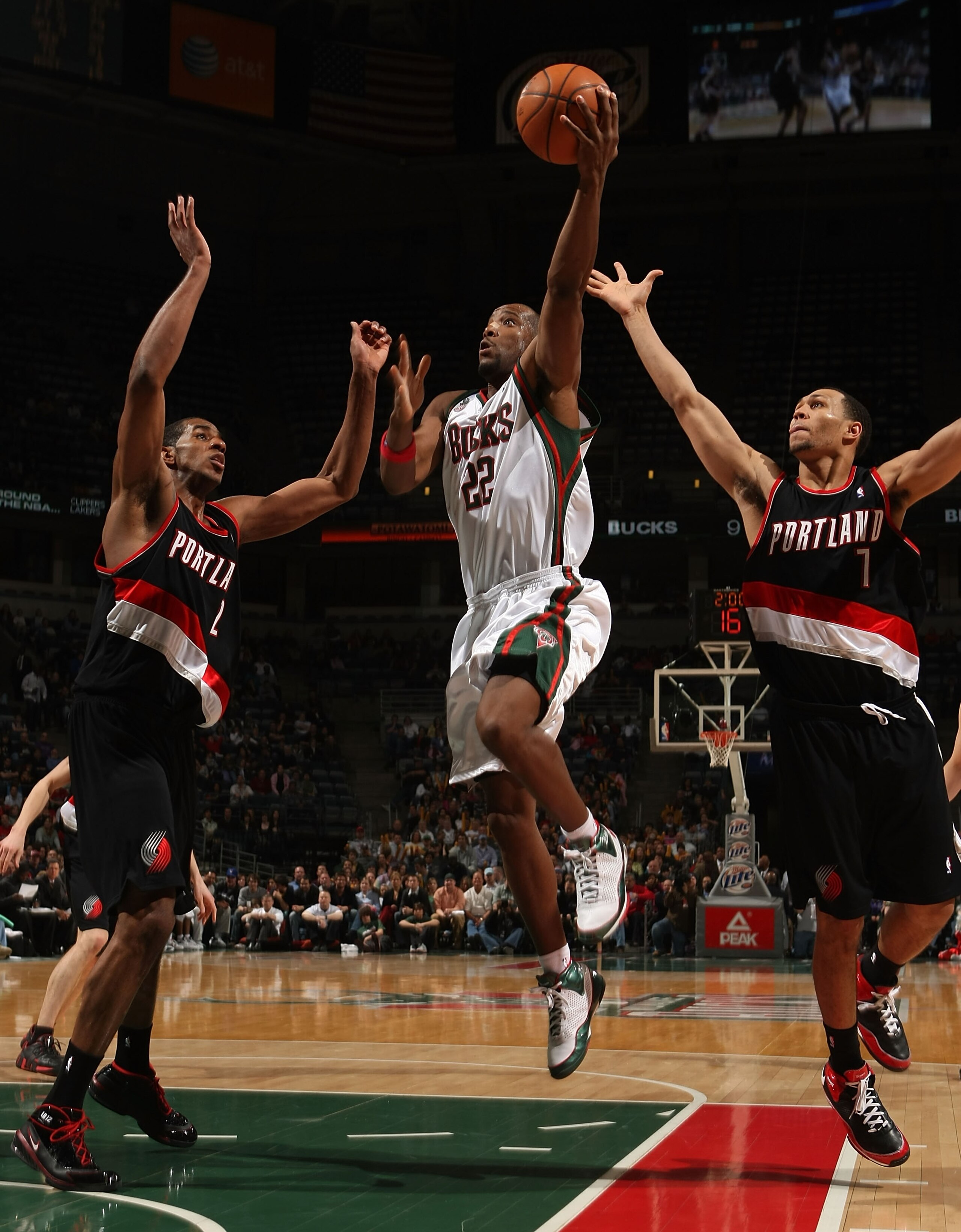 MILWAUKEE - MARCH 07:  Michael Redd #22 of the Milwaukee Bucks goes up for a shot between LaMarcus Aldridge #12 and Brandon Roy #7 of the Portland Trail Blazers at the Bradley Center March 7, 2008 in Milwaukee, Wisconsin. NOTE TO USER: User expressly ackn