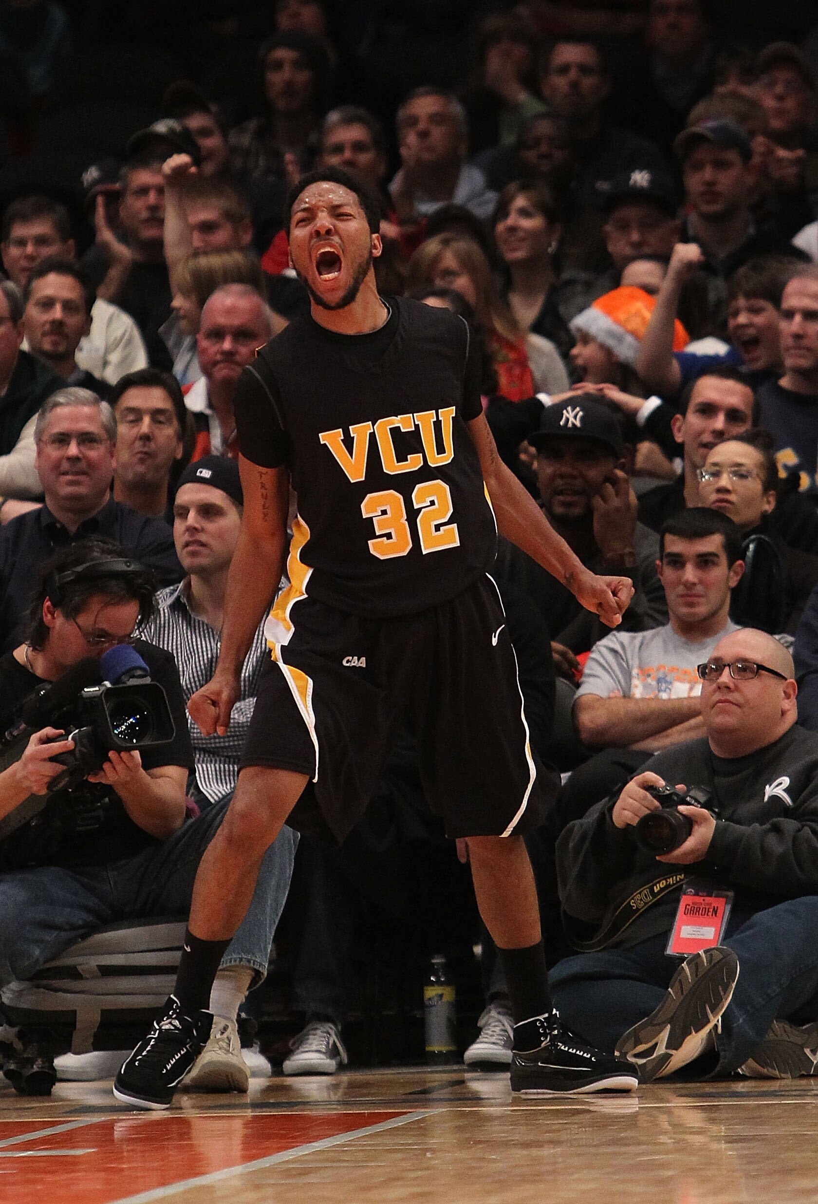 NEW YORK - NOVEMBER 26: Brandon Rozzell #32 of the Virginia Commonwealth Rams celebrates a basket  against the UCLA Bruins during their consolation game at Madison Square Garden on November 26, 2010 in New York City.  (Photo by Nick Laham/Getty Images)