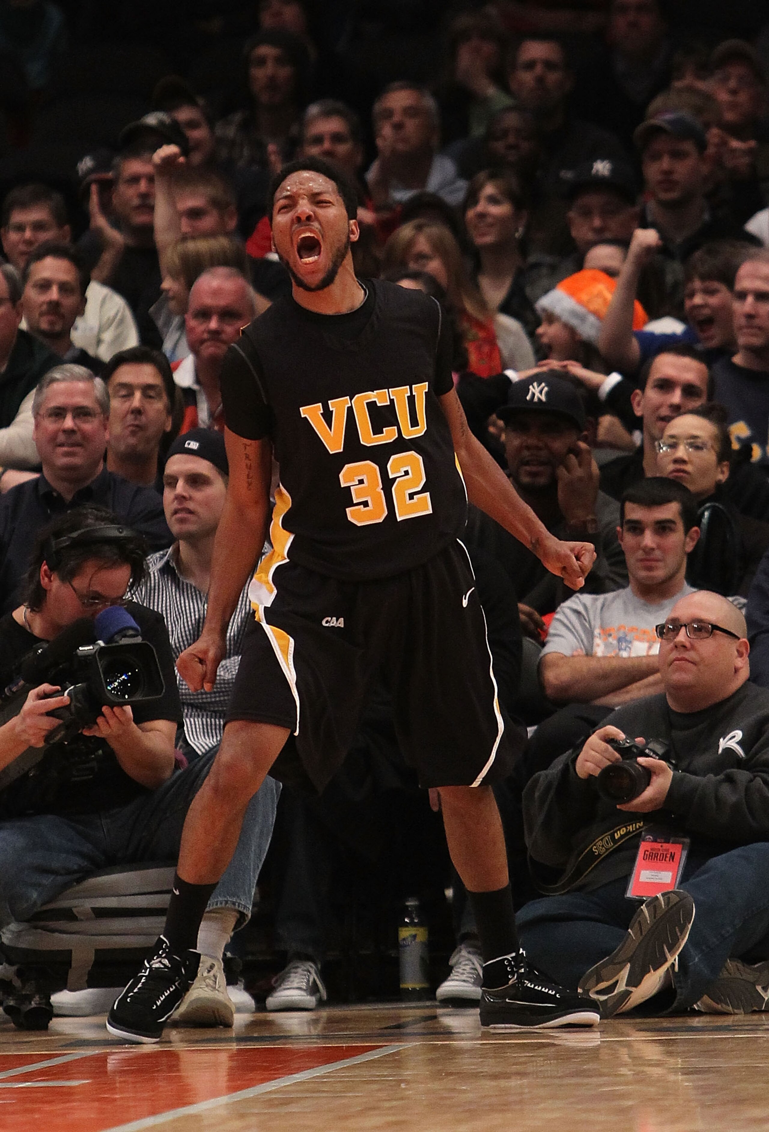 NEW YORK - NOVEMBER 26: Brandon Rozzell #32 of the Virginia Commonwealth Rams celebrates a basket  against the UCLA Bruins during their consolation game at Madison Square Garden on November 26, 2010 in New York City.  (Photo by Nick Laham/Getty Images)